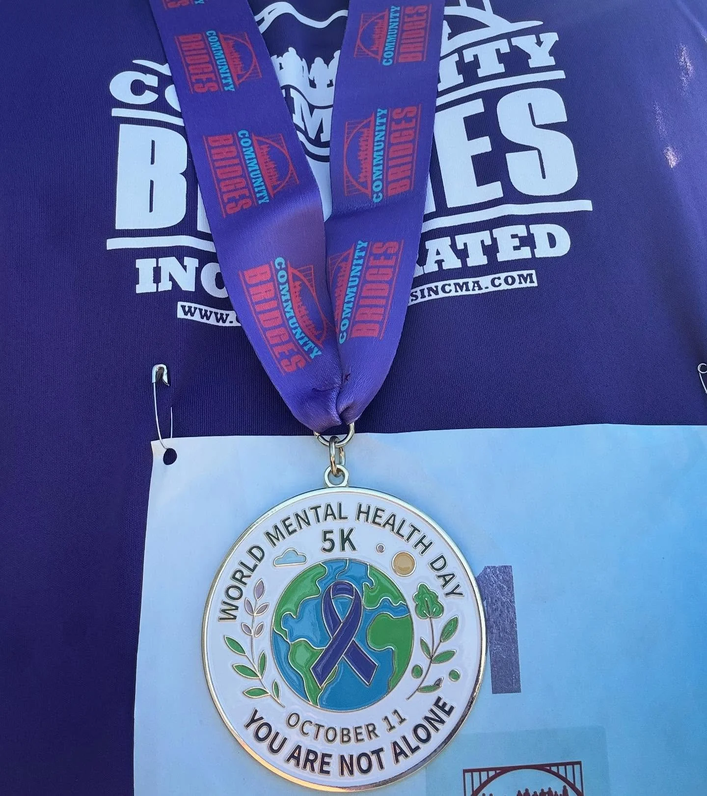 We loved bringing these shirts, medals & vinyl finish line banner to life for @community_bridges World Mental Health Day 5k! 💜🪩
#worldmentalhealthday2025 #customapparel #5k