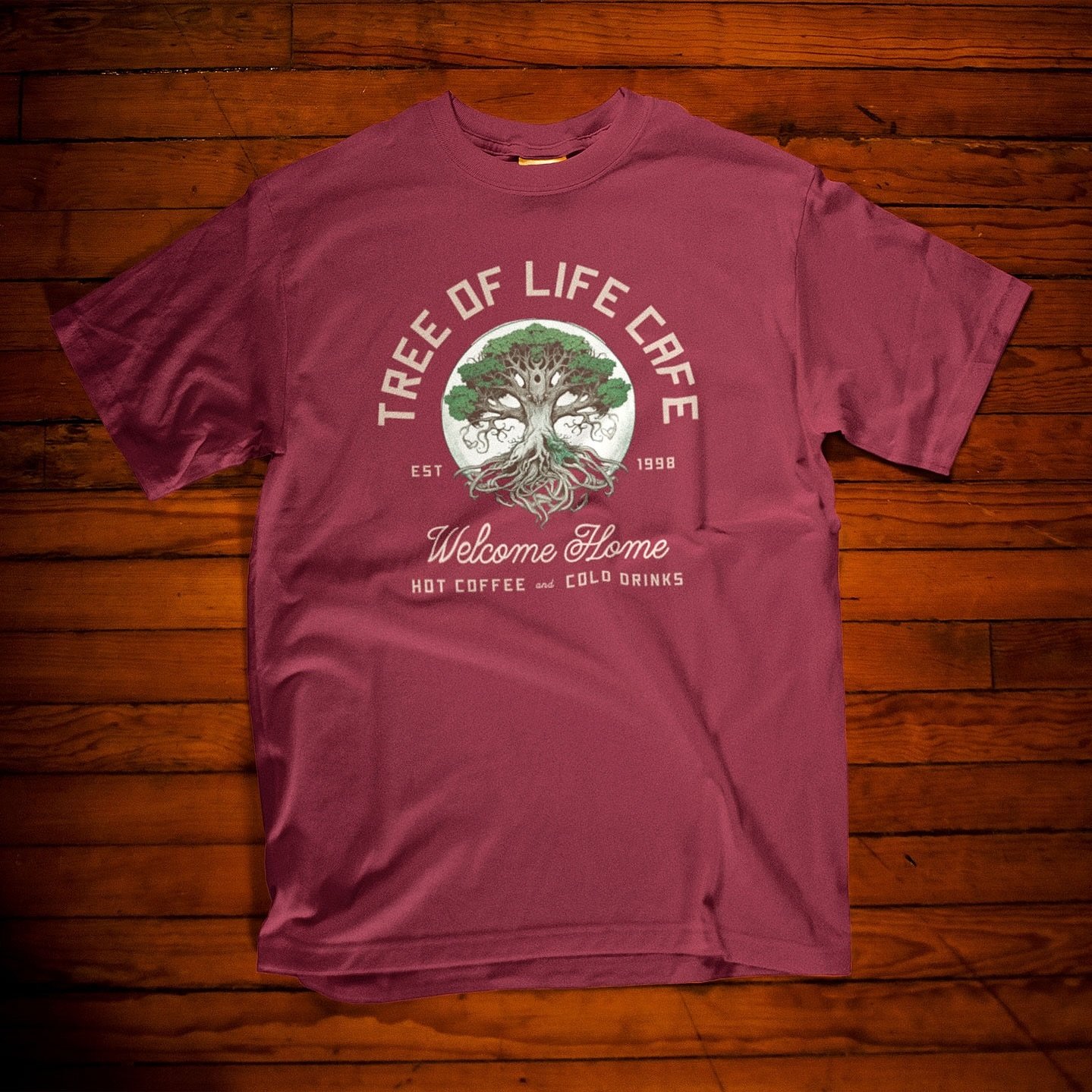 Step into the magical world of coffee wit our Tree of Life Cafe T-shirt! 

Inspired by the cozy vibe of enjoying a cup of coffee amidst the enchanting ambiance, this authentic original design captures the essence of Animal Kingdom magic for coffee lo