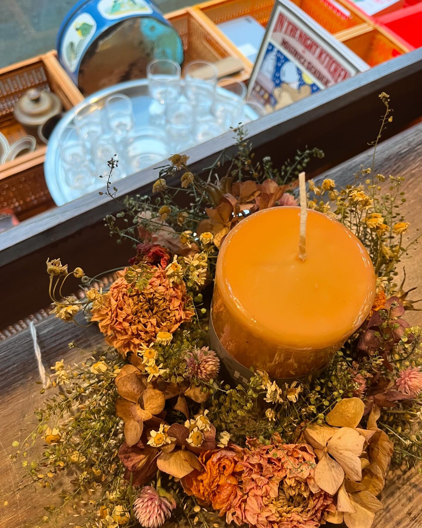 In the night kitchen, a table centrepiece and sets of Finnish 70&rsquo;s glasses