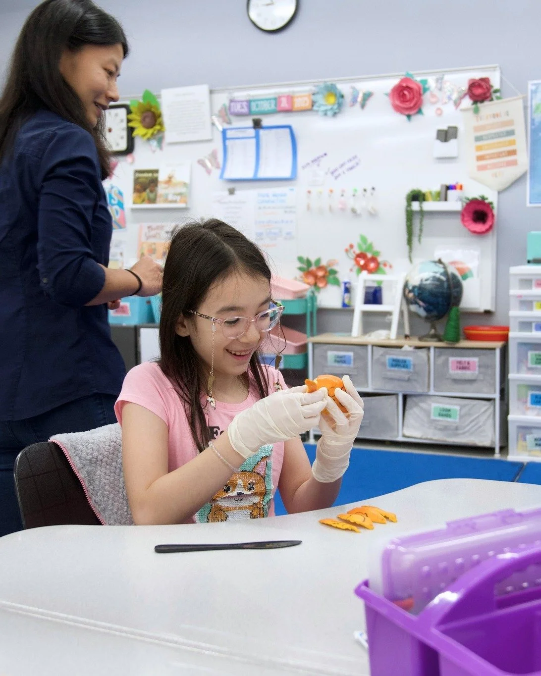 Spotted on the Boulevard: the cartographer’s dilemma!
Our fourth graders explored just that! Given a clementine, they were tasked with drawing the globe on it and then peeling it into 8 equal sections. What did they find? Distortion of their d