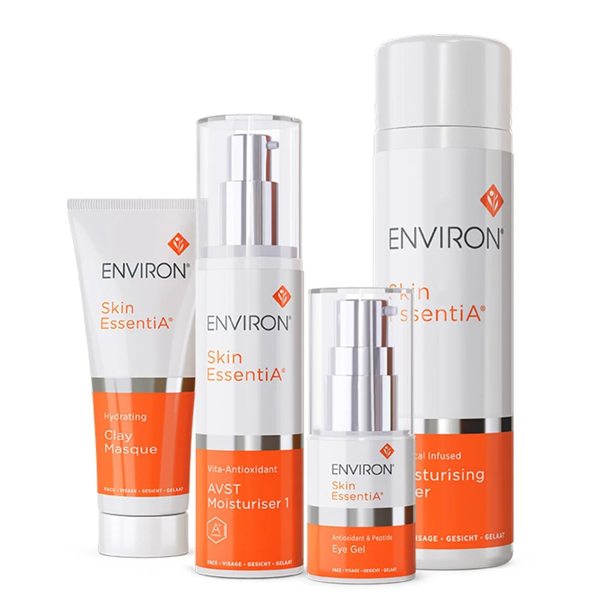 Set of five personal skincare products in white and orange packaging, including a tube, two pump bottles, a spray bottle, and a jar, labeled Environ Skin EssentiA.