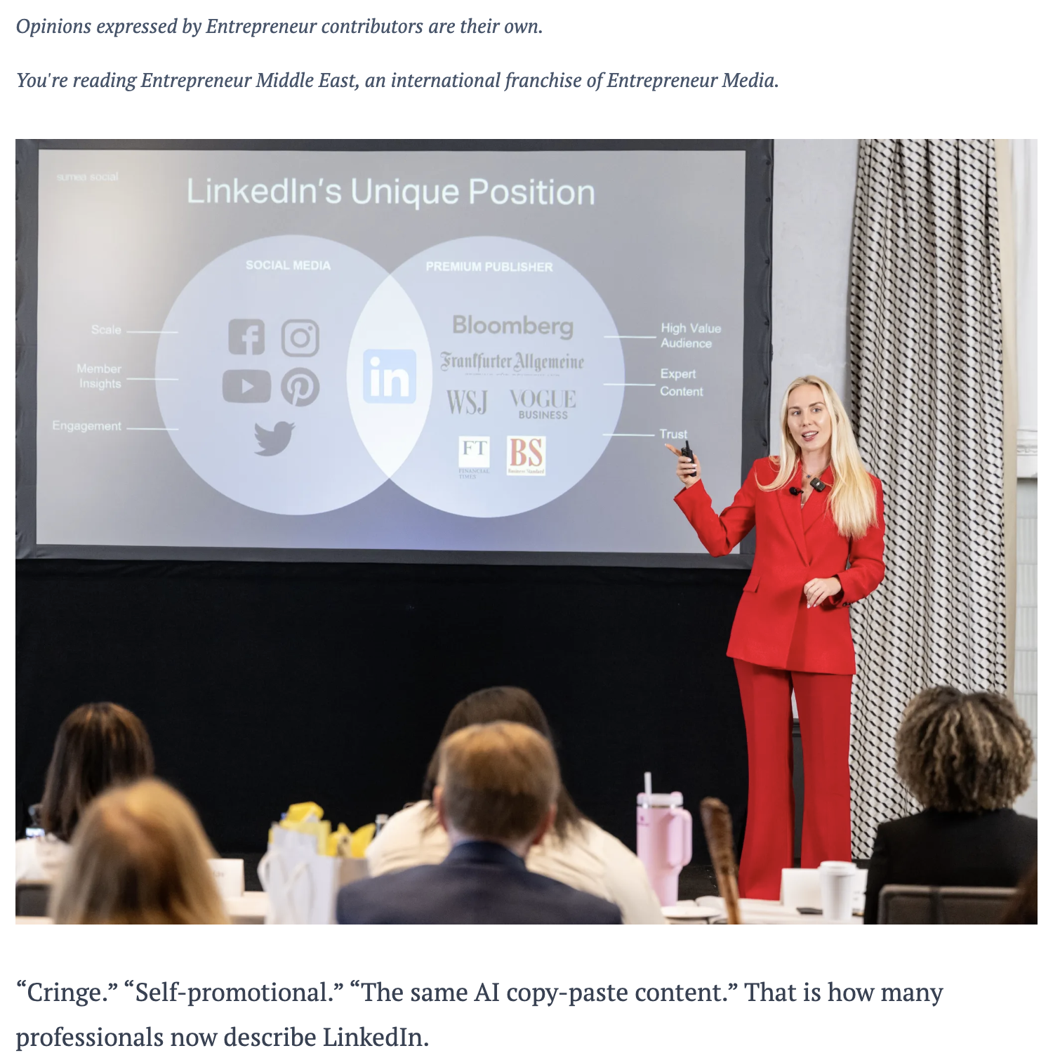 A woman in a red suit giving a presentation in front of a slide titled "LinkedIn's Unique Position," showing Venn diagram comparing social media and premium publisher aspects of LinkedIn. Audience members watching the presentation are visible from the back.
