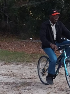 Dea Pratt on Bike 5.png