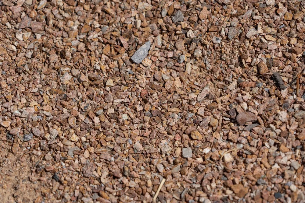 Small orange, red, and brown rocks make up this option for landscaping available at Garden Center of Las Cruces, New Mexico. 