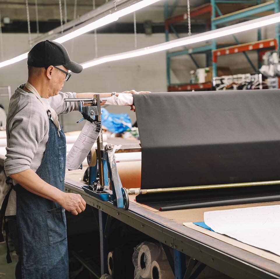 They see me rollin&rsquo;. 🎵
Our talented cutter Jack is hard at work rolling out fabric that will soon be cut into wonderful custom garments for our customers. 

🧵Learn more at crwdesign.ca