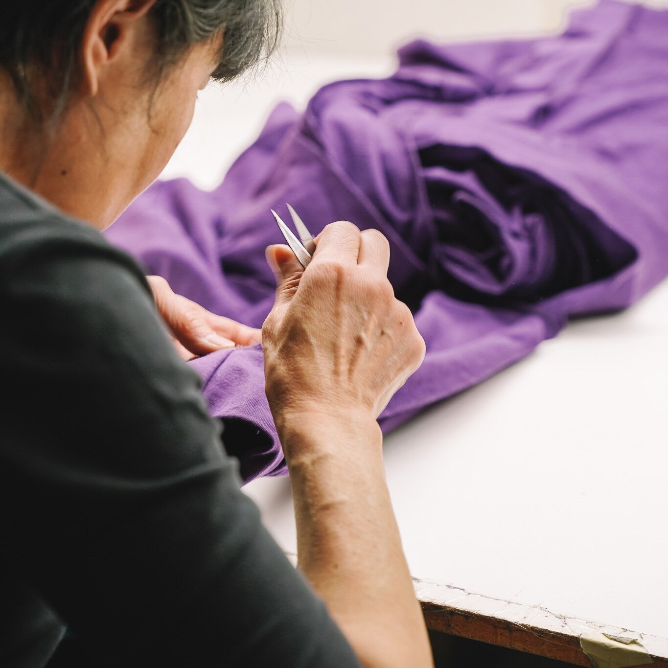 Checking each garment over for any imperfections or loose threads - it&rsquo;s all part of what we do to ensure you receive quality garments. 

🧵Learn more at crwdesign.ca
