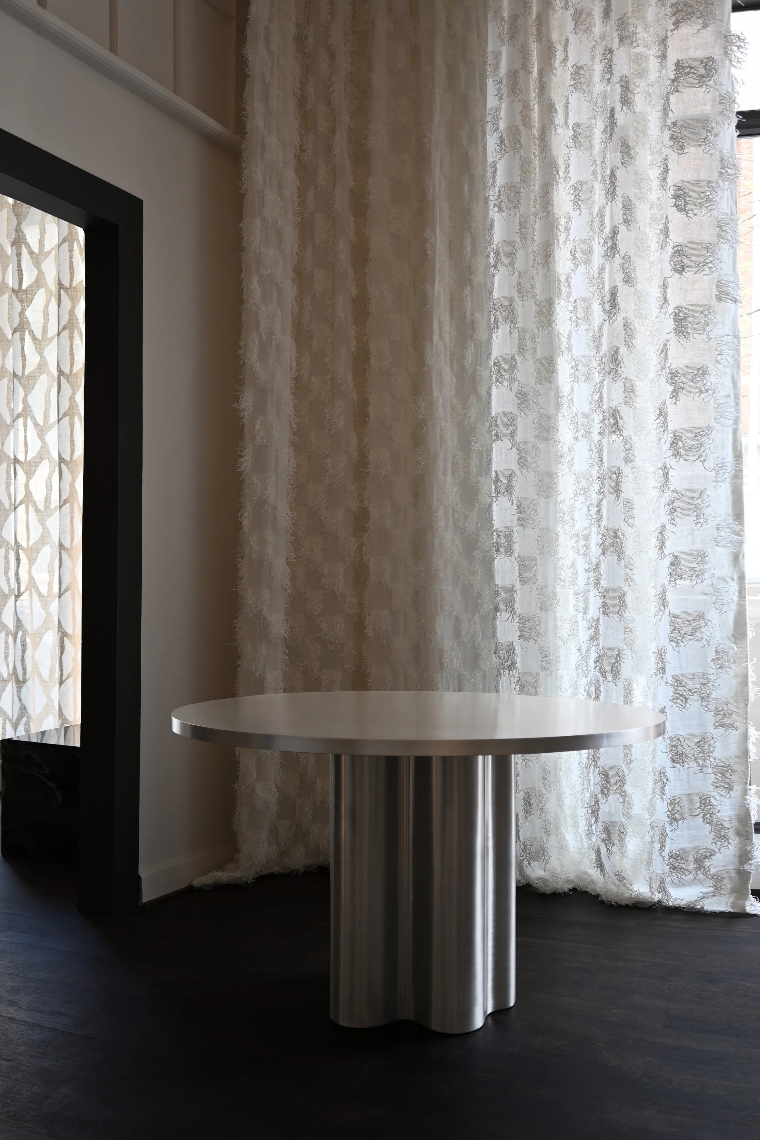 Stlver root Steel table.jpg