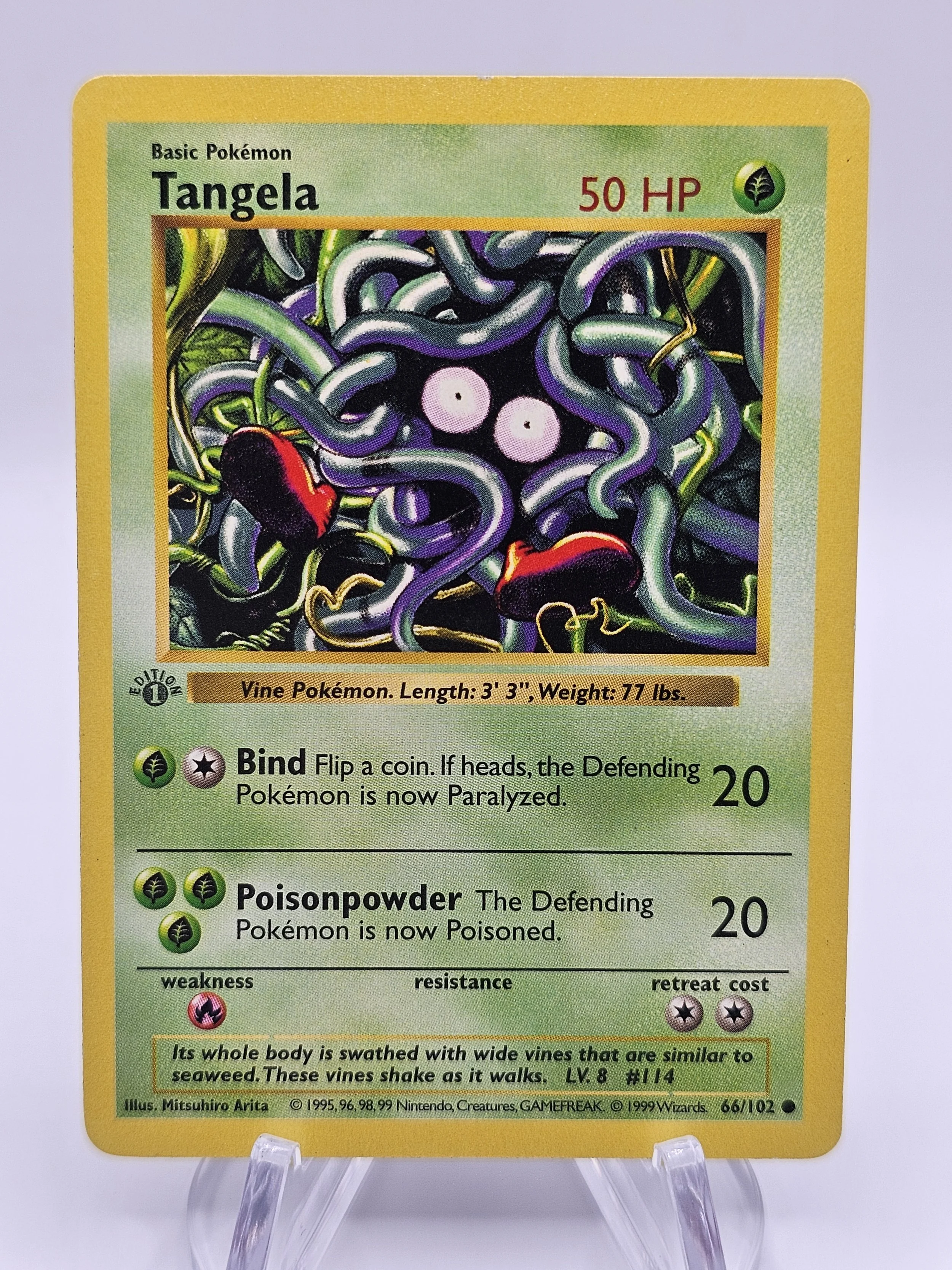 Tangela 66/102 Shadowless 1st Edition *Grey Stamp Error*