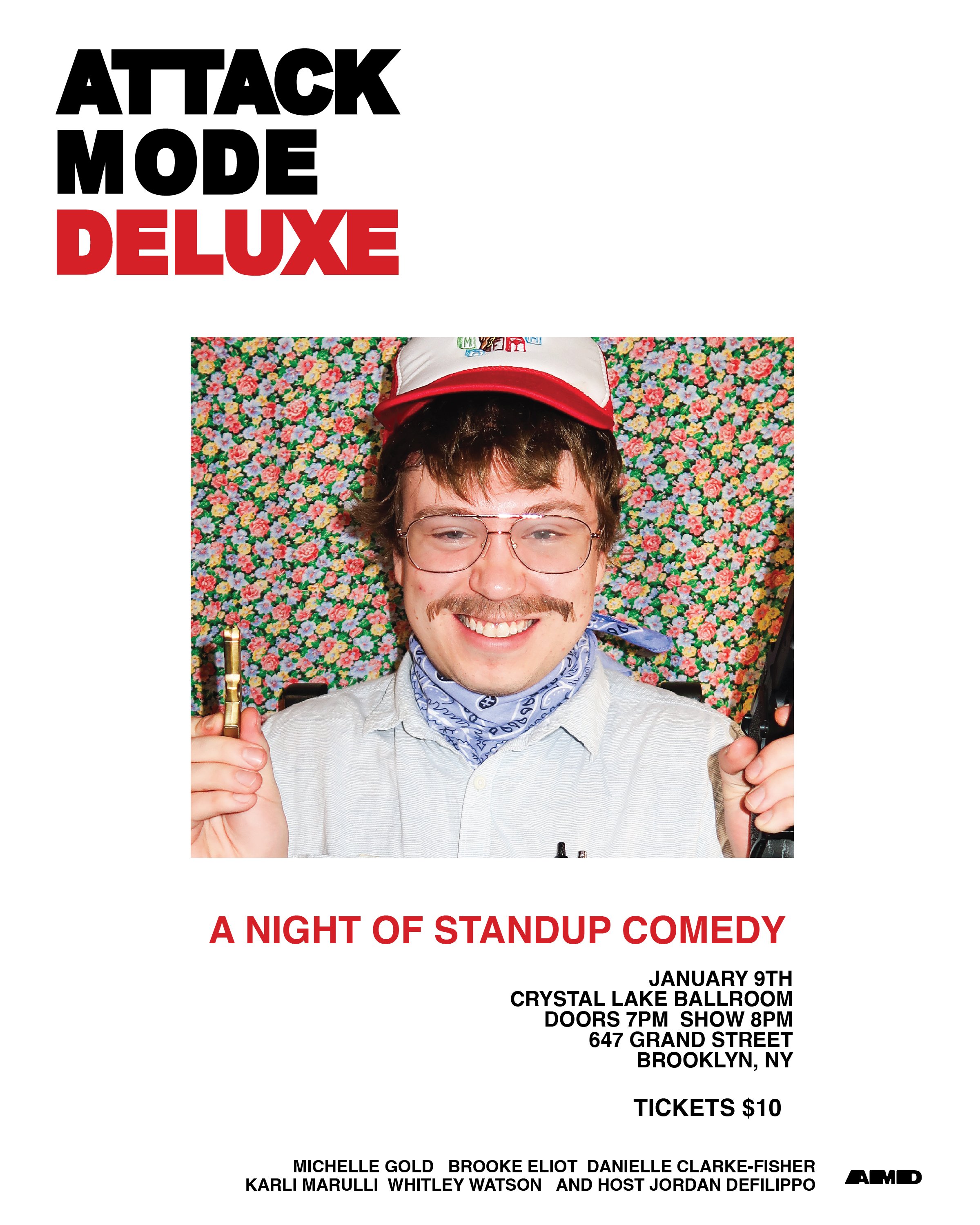 Event poster for 'Attack Mode Deluxe' comedy show featuring a smiling man with glasses, a mustache, wearing a cap, bandana, and holding a pen and scissors, with colorful floral background.