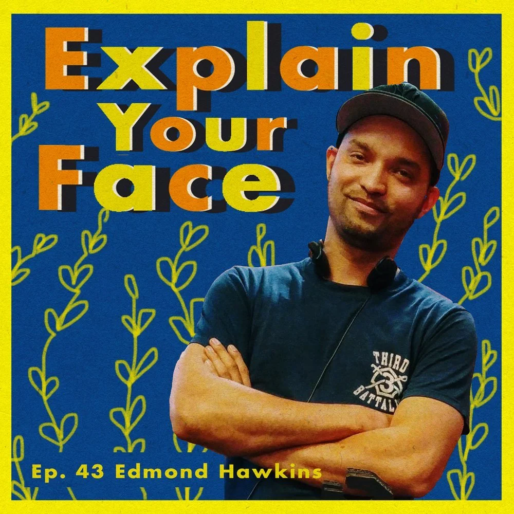 Promotional graphic for a podcast titled "Explain Your Face" featuring Edmond Hawkins, with a photo of a man with crossed arms, wearing a black cap and navy shirt, set against a blue background with yellow and green decorative elements.
