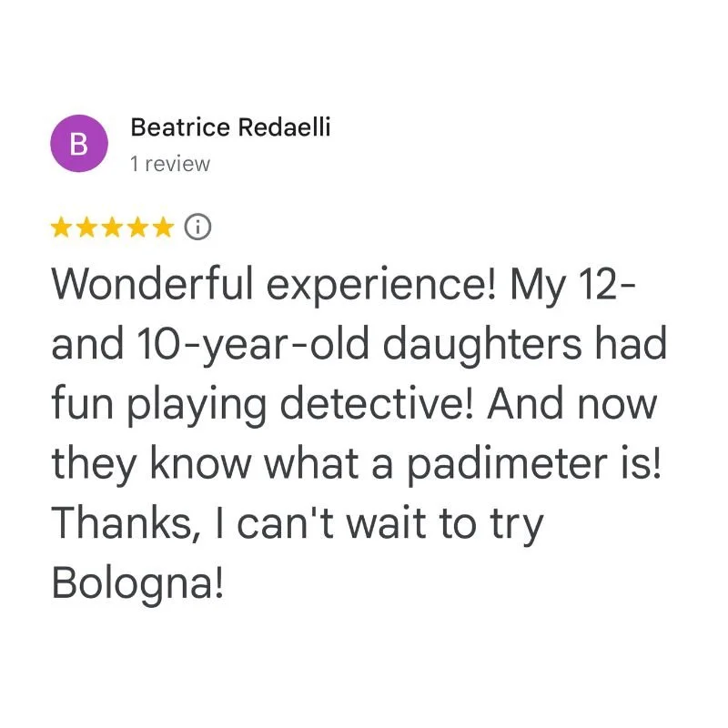 Screenshot of a positive review by Marzia Santilli in Italian, praising discovering a city, involving children, uncovering secrets, and expressing excitement for visiting soon.