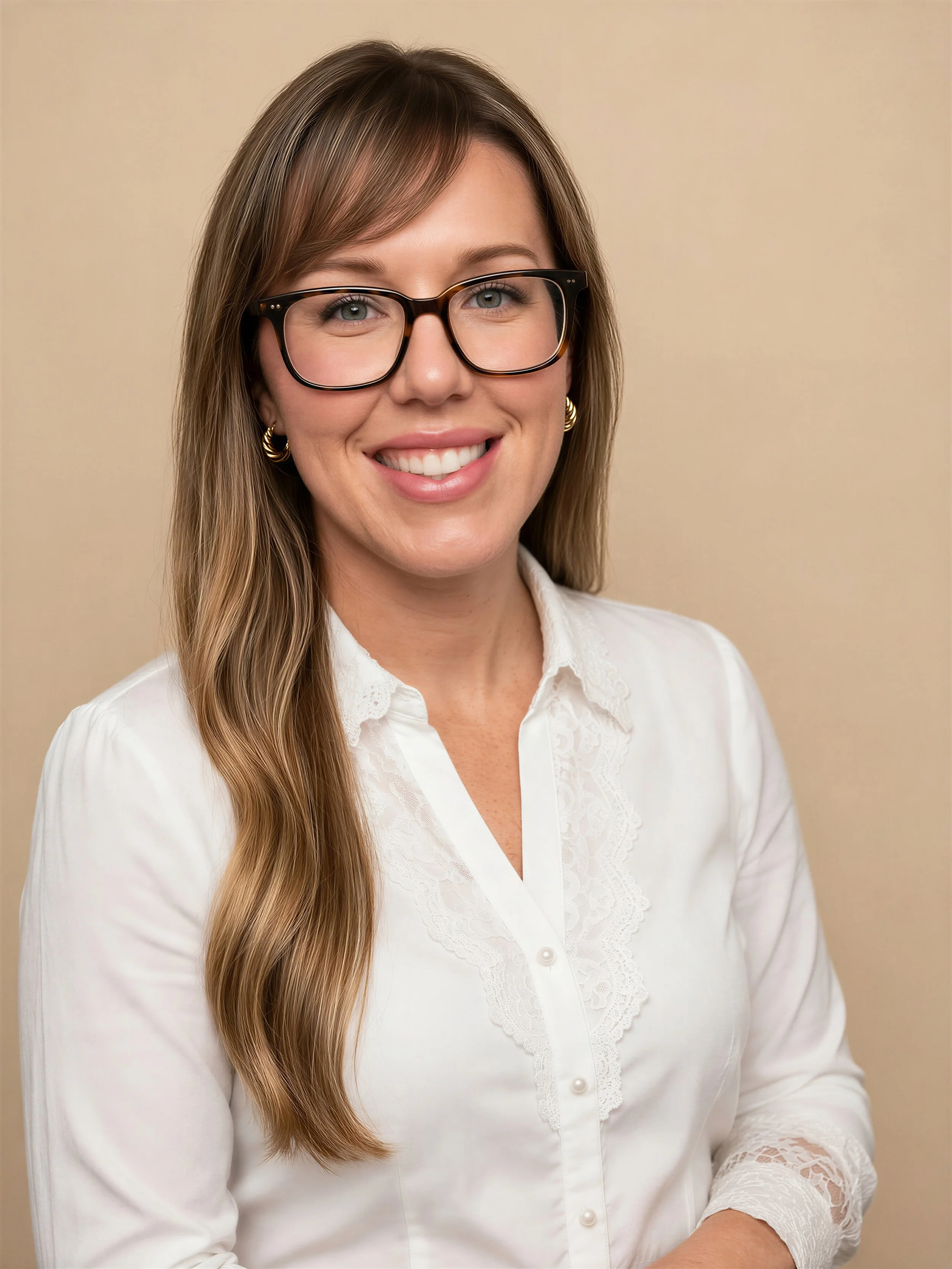 White female with glasses, professional , pleasant and smart, compassionate, takes time to listen to patients