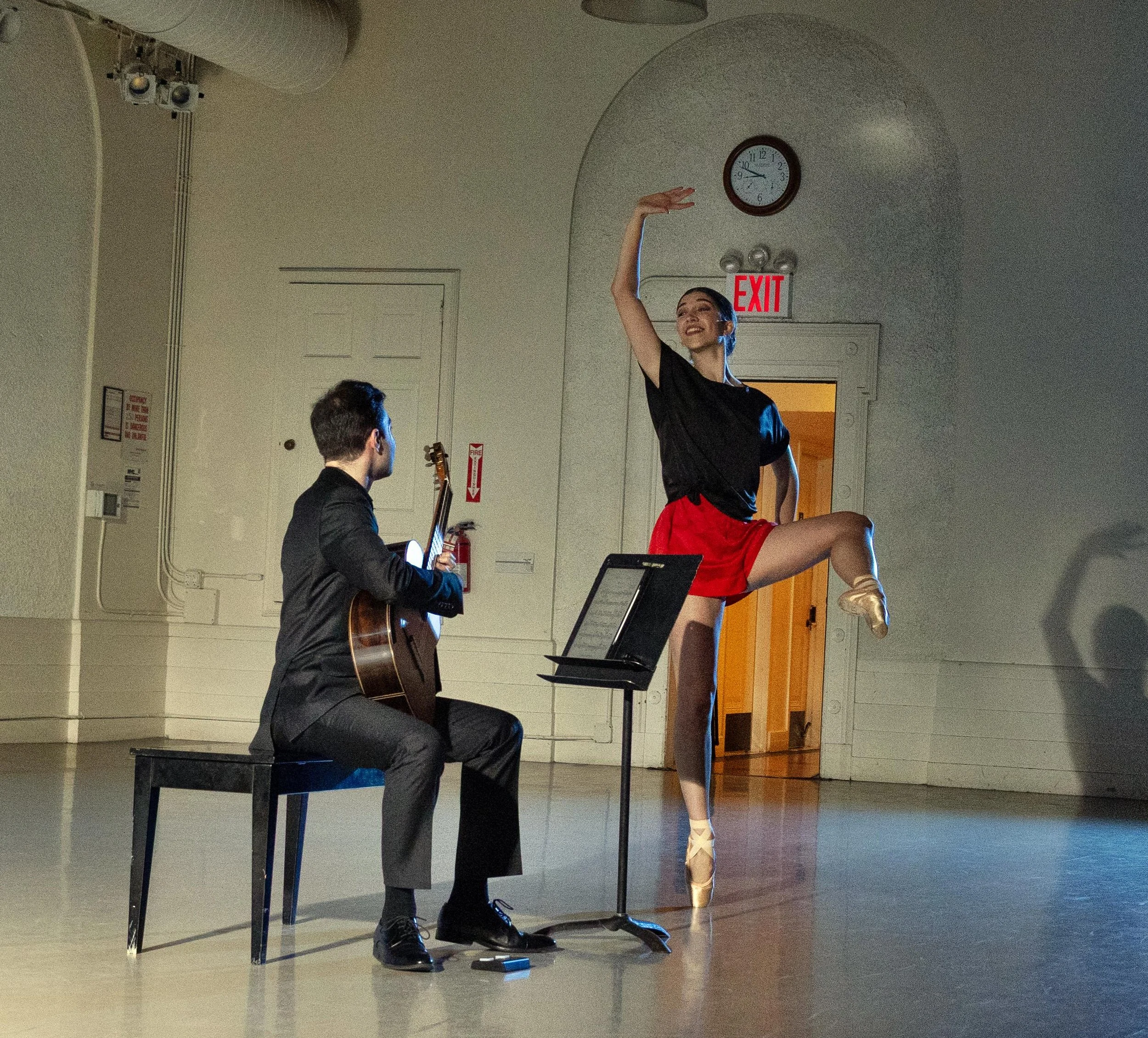 Other Classical guitarist Max Barker and dancer Claire Bucci in "A Pop-Up Ballet at New York City Center," an evening of choreography by Kathryn Roszak,
