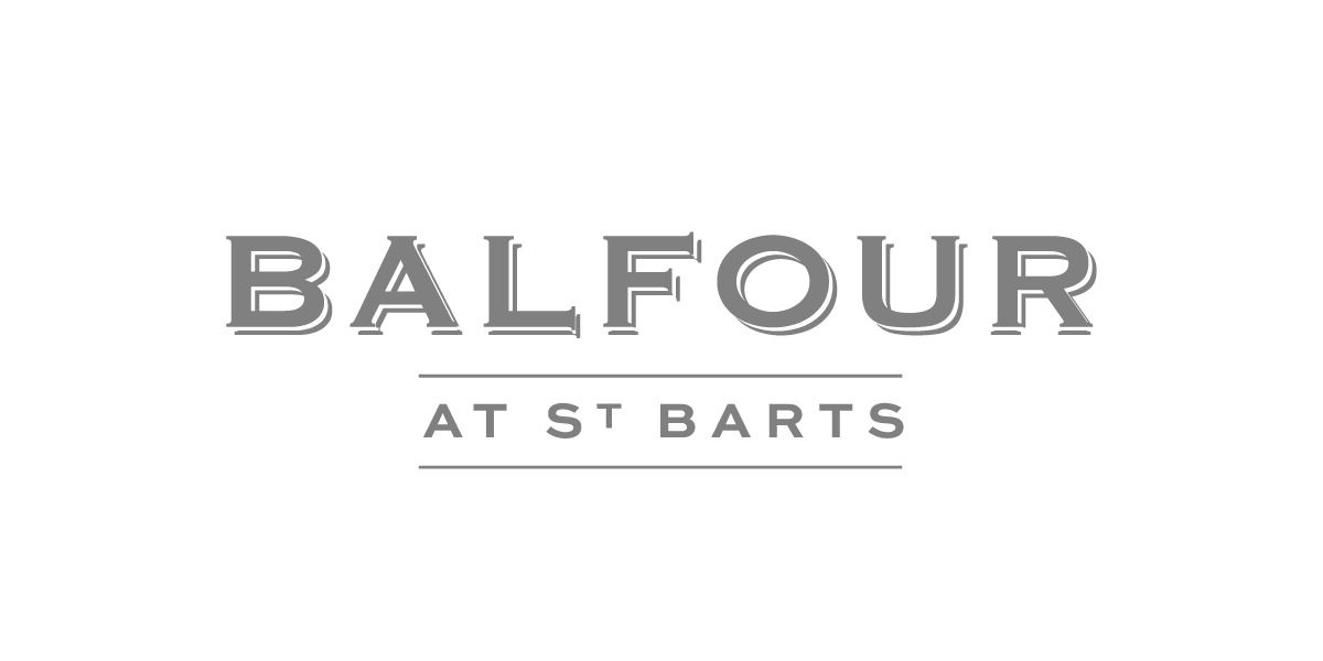 Logo for Balfour at St. Barts with the text "BALFOUR" in large gray letters and "AT ST BARTS" underneath, separated by lines, on a black background.