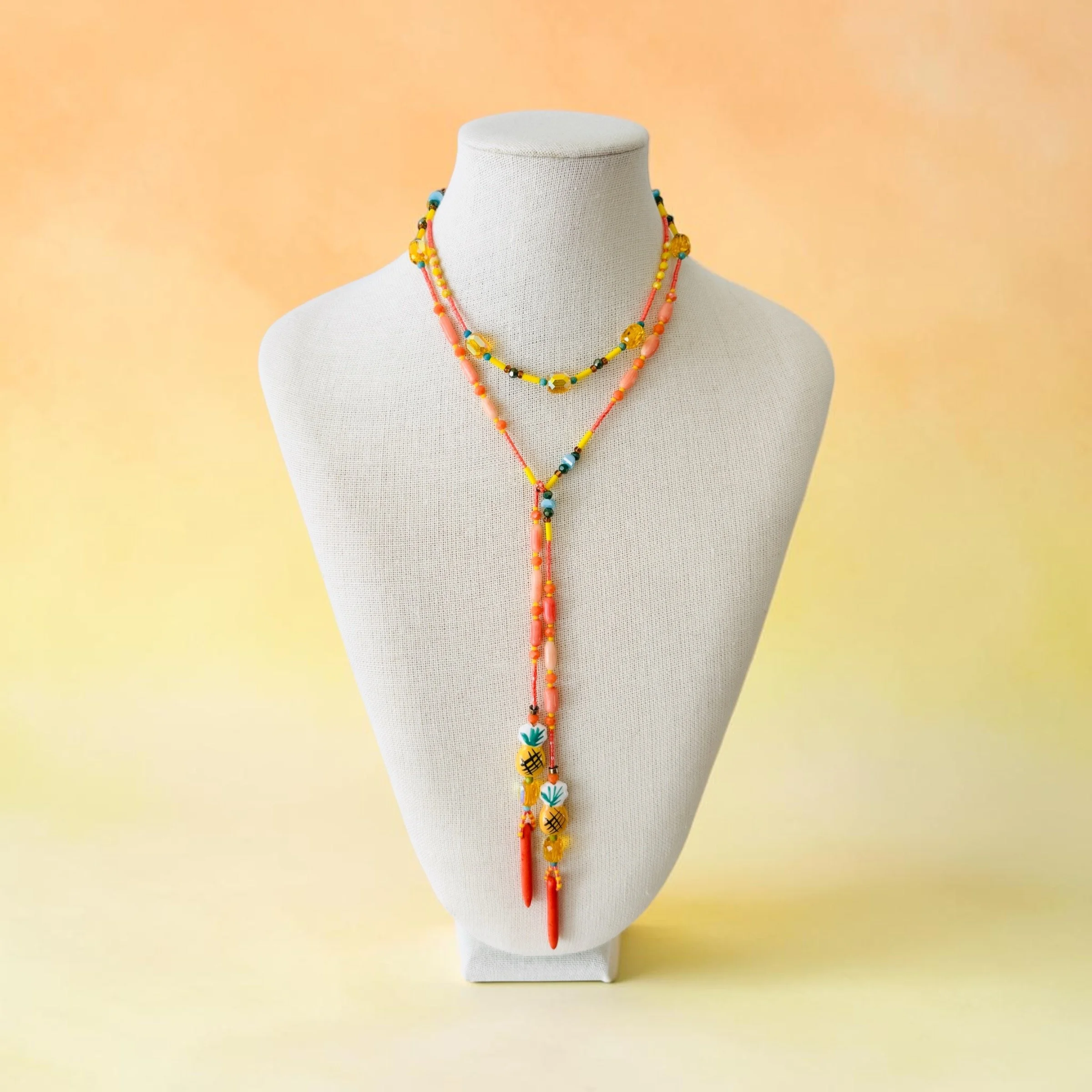 Pineapple Orangle Lariat Necklace_Bust_Ratio 1 1.jpeg