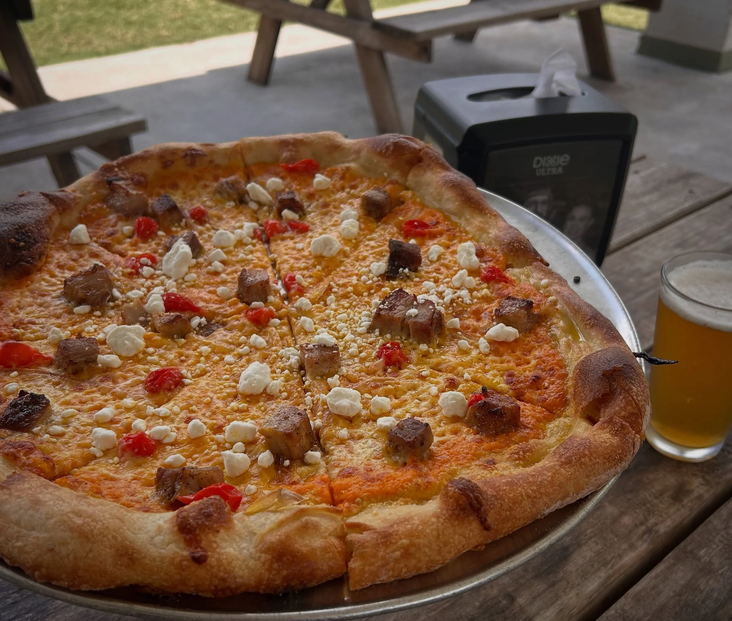 PIZZA OF THE MONTH! Pork belly, carrot puree, sweet peppers and ch&egrave;vre

All June!