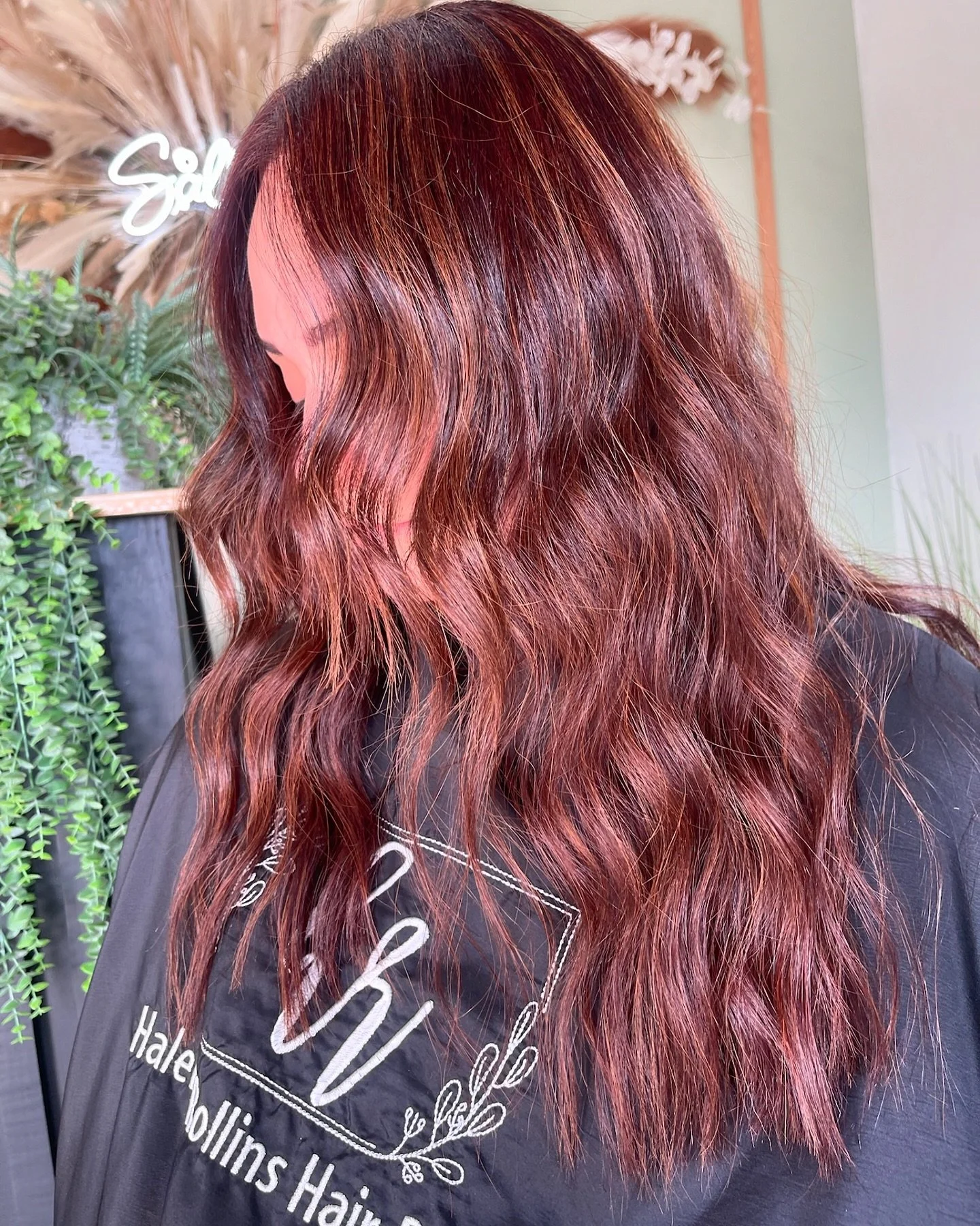 A stunning, dimensional look that&rsquo;s equal parts vibrant and soft. 
This color correction was all about creating a rich, dark red base that gives major depth while blending in a caramel and copper-toned balayage for a perfect color that turns he