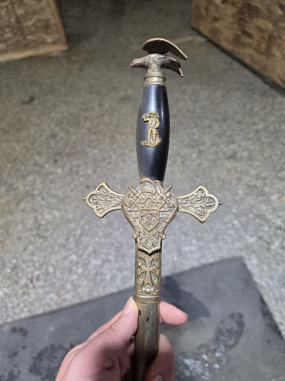 Antique Knights Templar ceremonial sword with an eagle pommel and brass crest guard