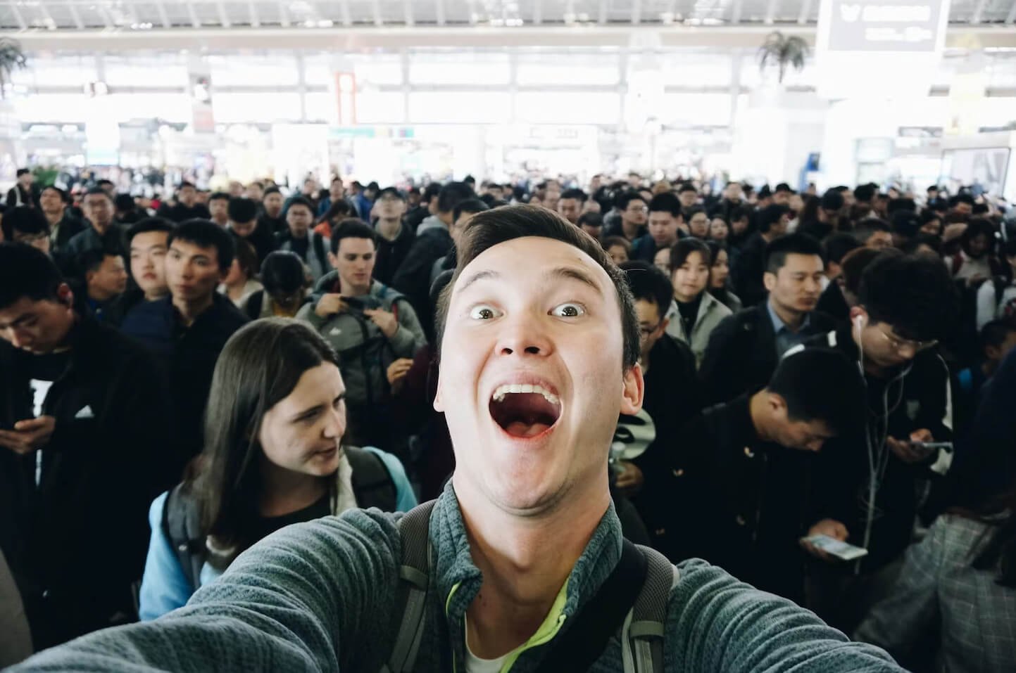 Nathan at a very crowded train station in China.