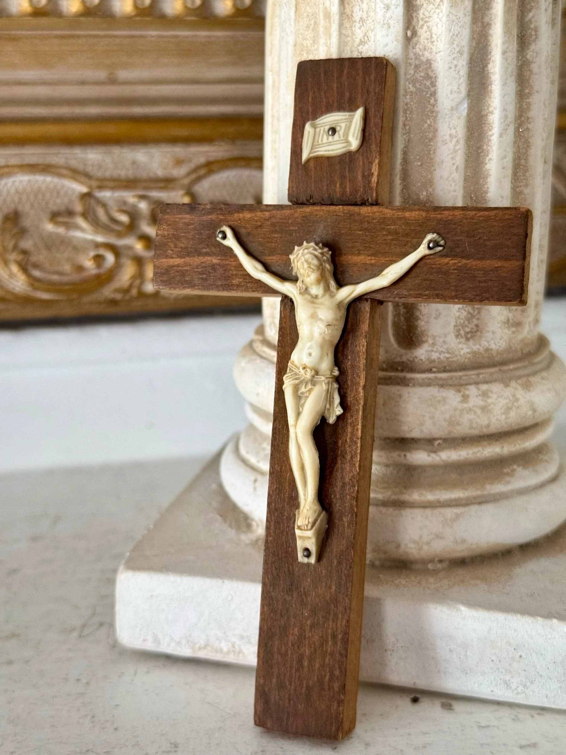 vintage carved bone crucifix and wood