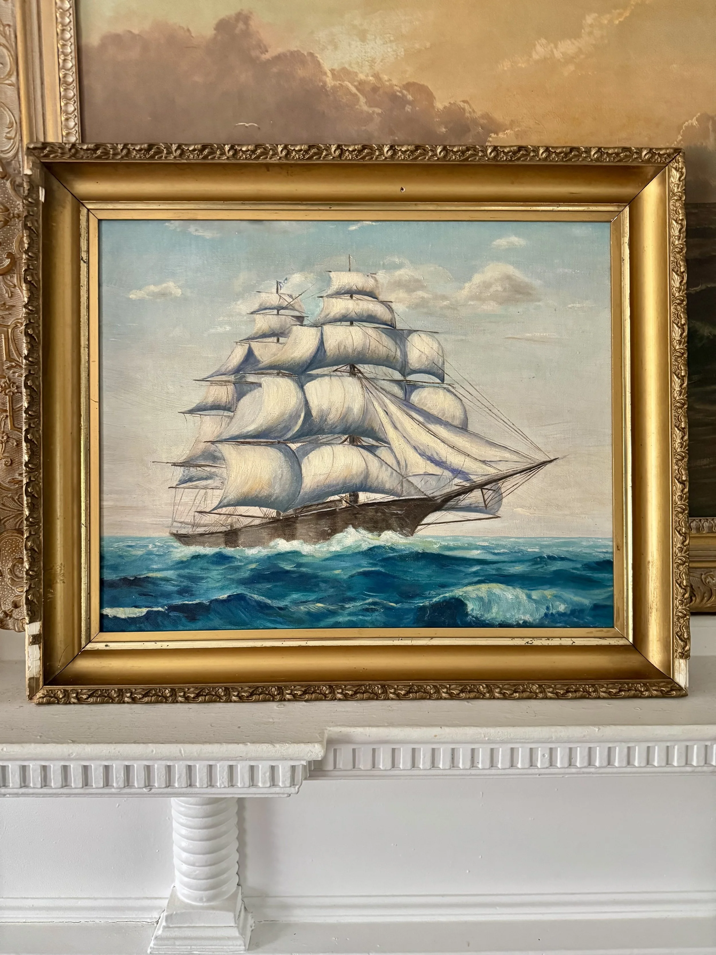 mid-century ship painting in antique frame