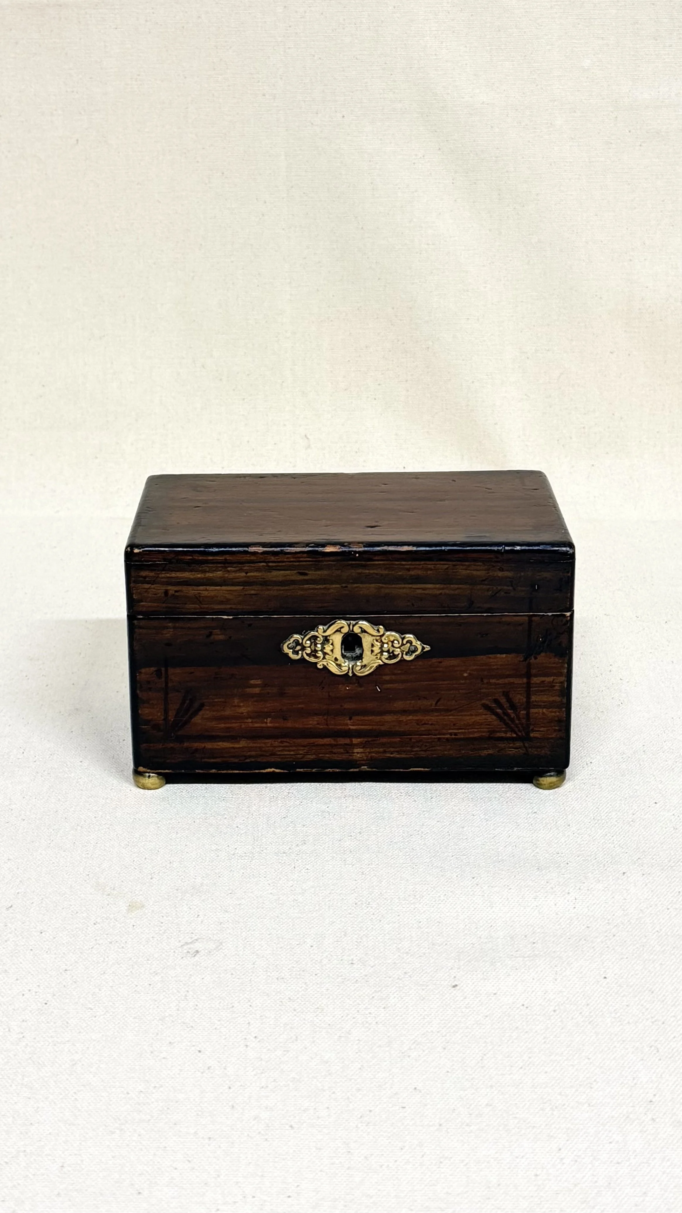 PETITE ANTIQUE BOX WITH BRASS DETAILS