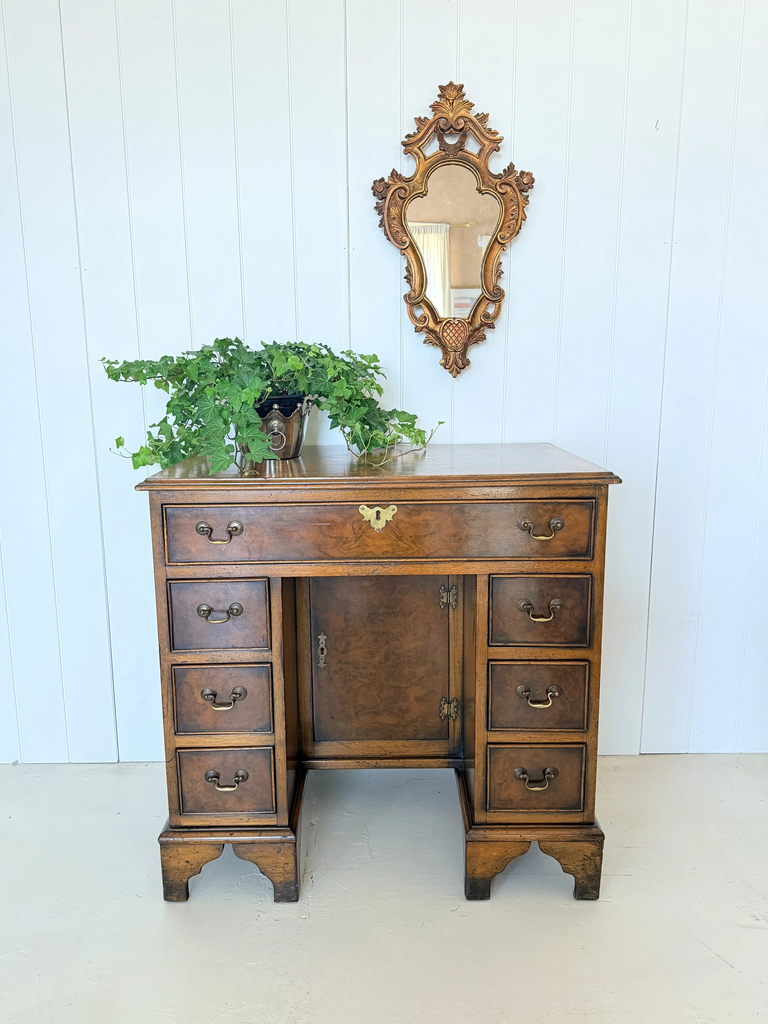 WALNUT & INLAID KNEEHOLE DESK WITH OVAL INLAY