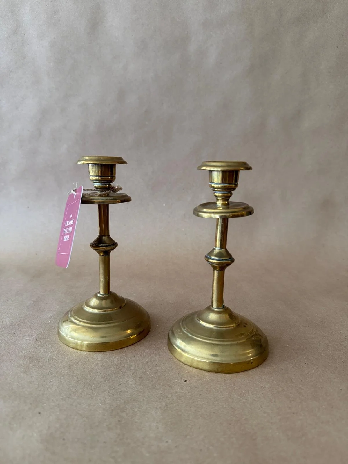 PAIR OF ANTIQUE BRASS CANDLESTICKS