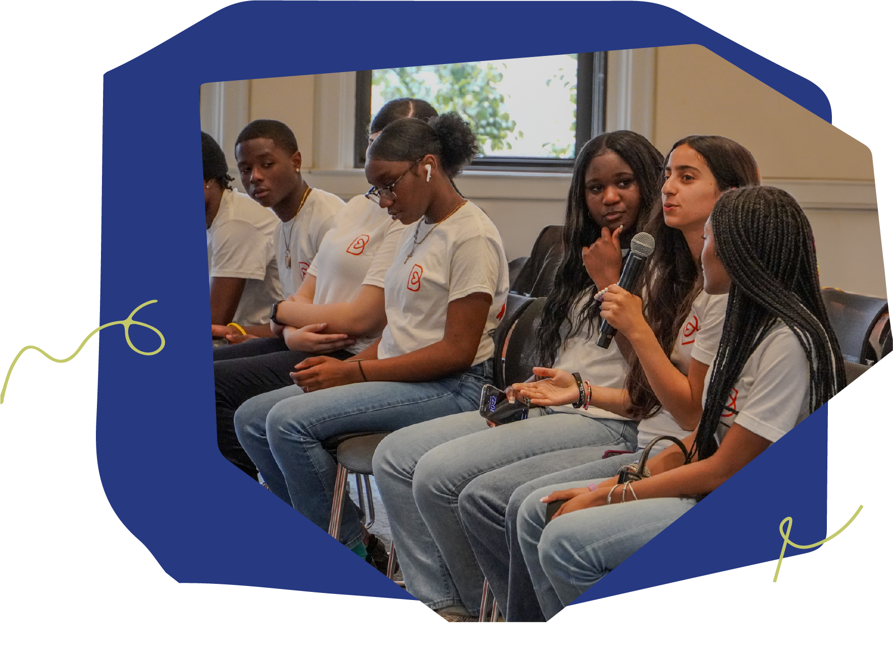start strong peer leaders on a panel, one holding a microphone during a group discussion