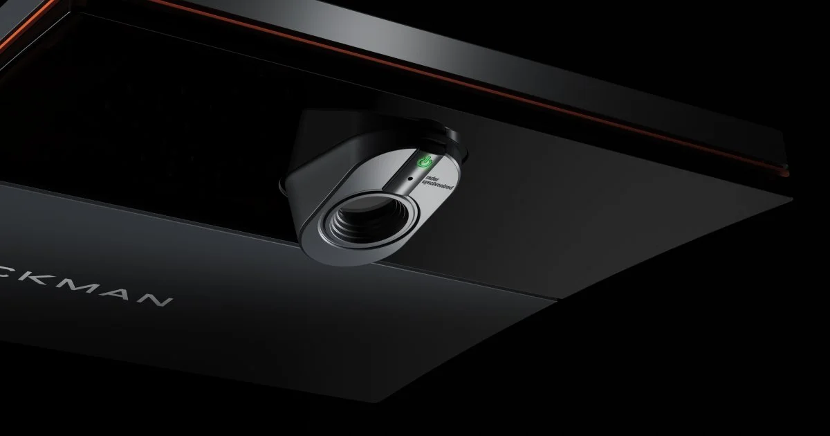 Close-up of a Trackman iO launch monitor in a TeeGo simulator bay
