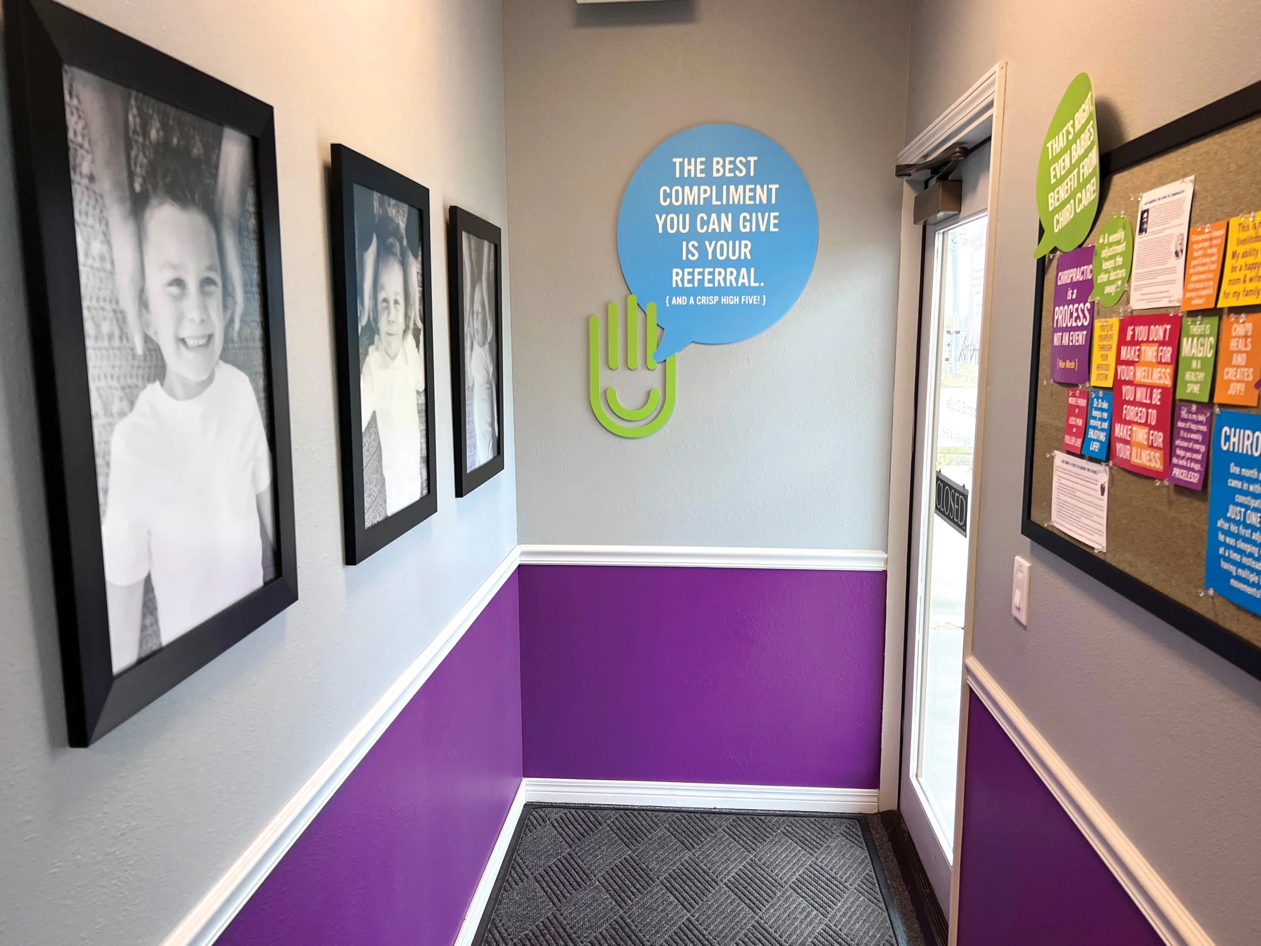 Office entrance with photos of children displayed