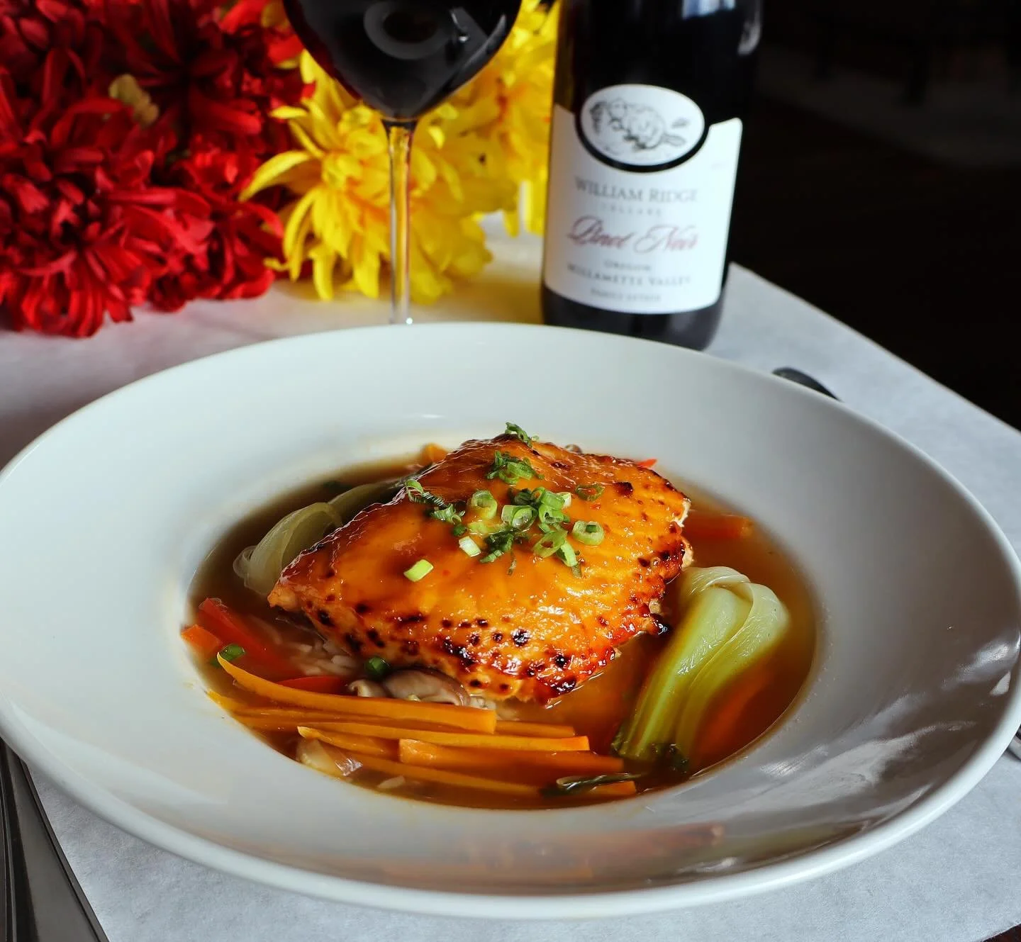 Something to warm your heart, soul and belly. Come try our Miso Glazed Atlantic Salmon with basmati rice, bok choy, carrots, peppers and mushrooms in an aromatic ginger broth!