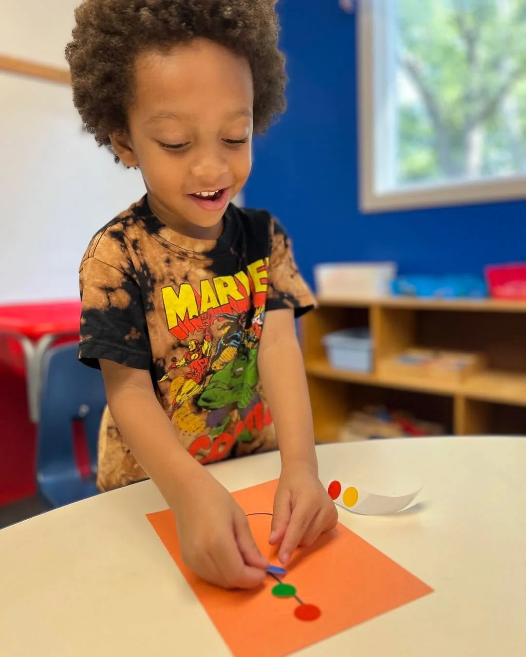 We stuck to our very first learning goals as we identified the letter of our first name and placed stickers on the lines of our letter. Using our pincher finger to peel stickers, letter identification and following directions were the goals we rocked
