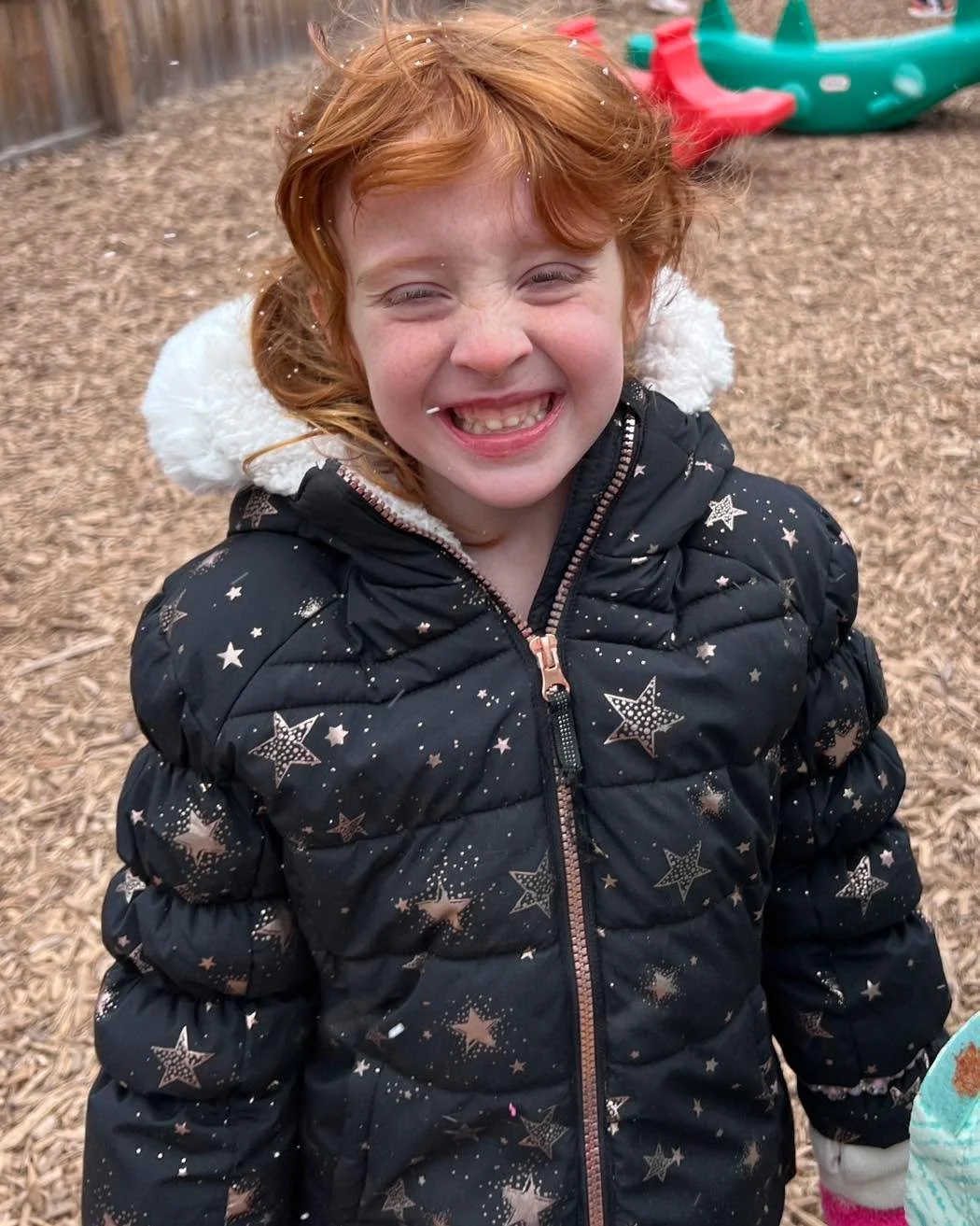 The pure joy of feeling snowflakes at outdoor play! ❄️☃️❄️