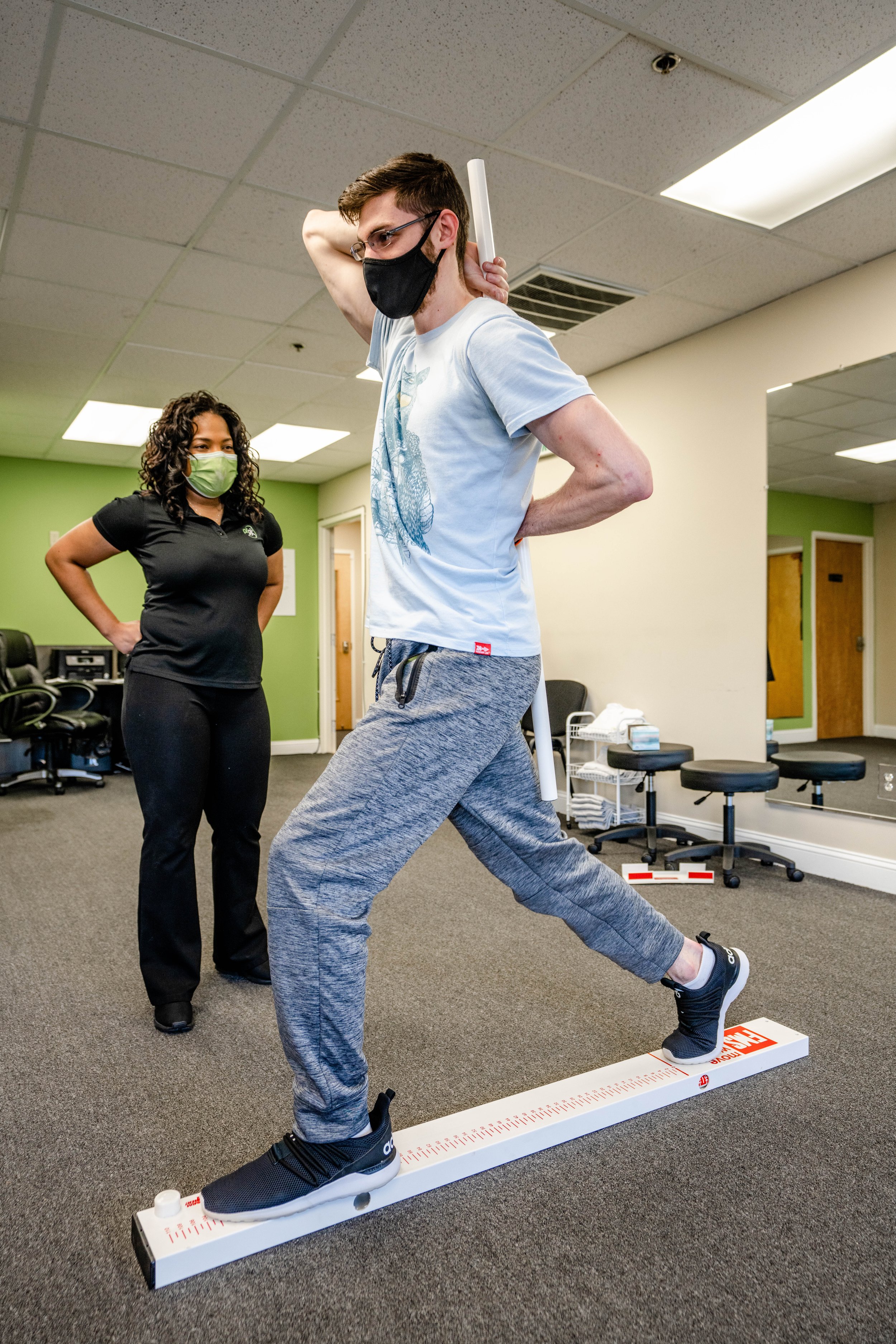  One-on-one physical therapy session at Physically FIT 