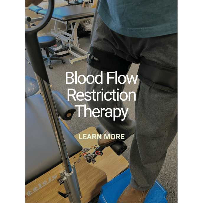A photo of one of our clients trying blood flow restriction physical therapy.
