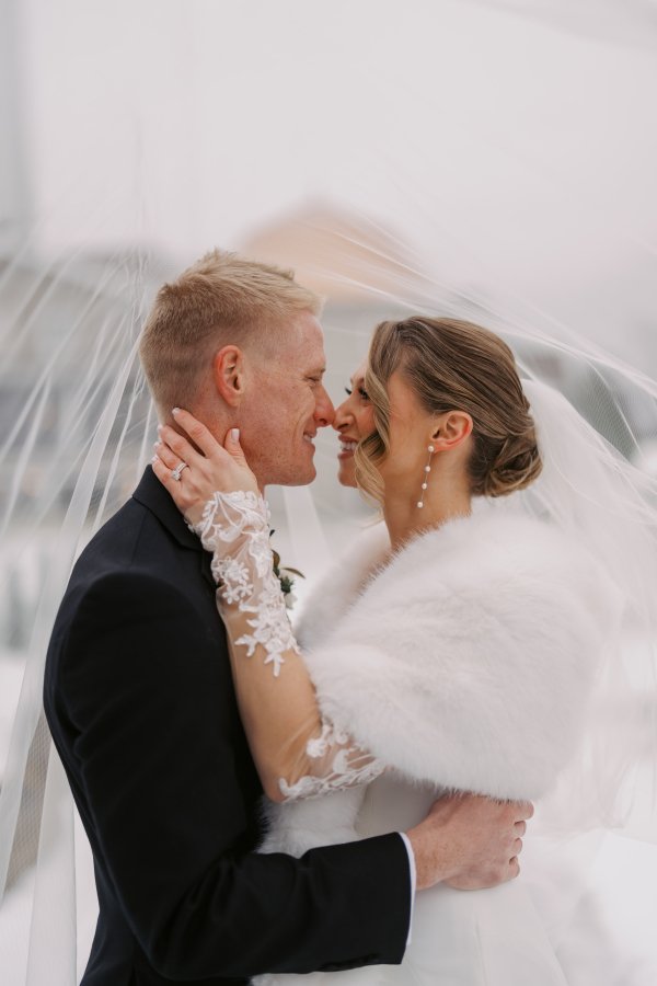 bride and groom winter veil.jpg