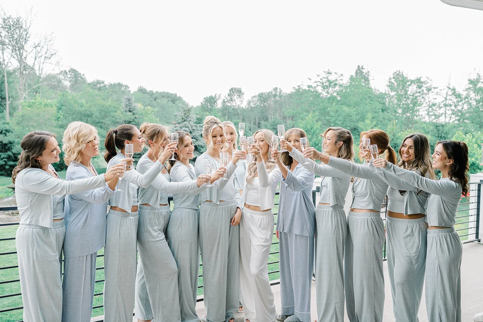 bridal party cheers champagne.jpg