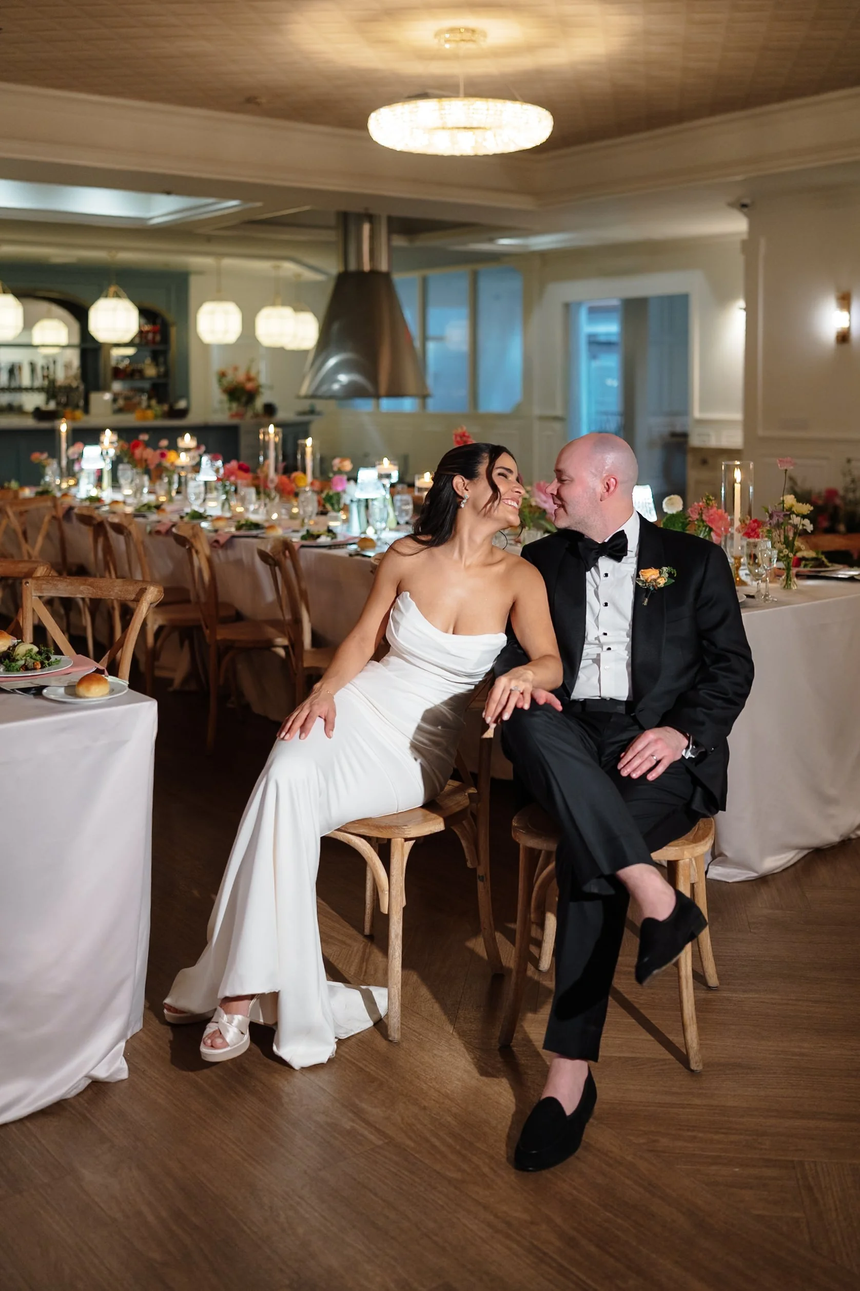 bride & groom, kissing, ball room.jpg