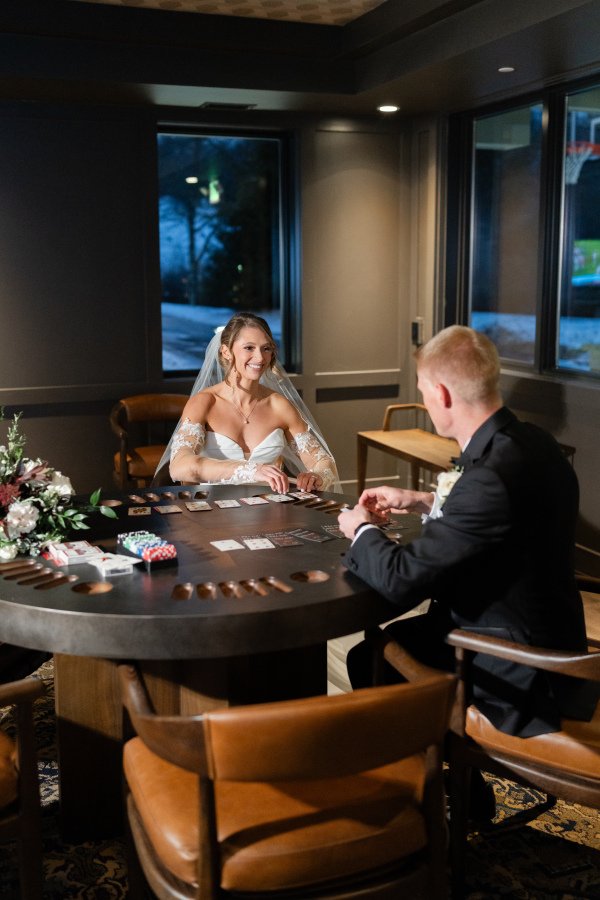 poker table bride and groom plays cards.jpg