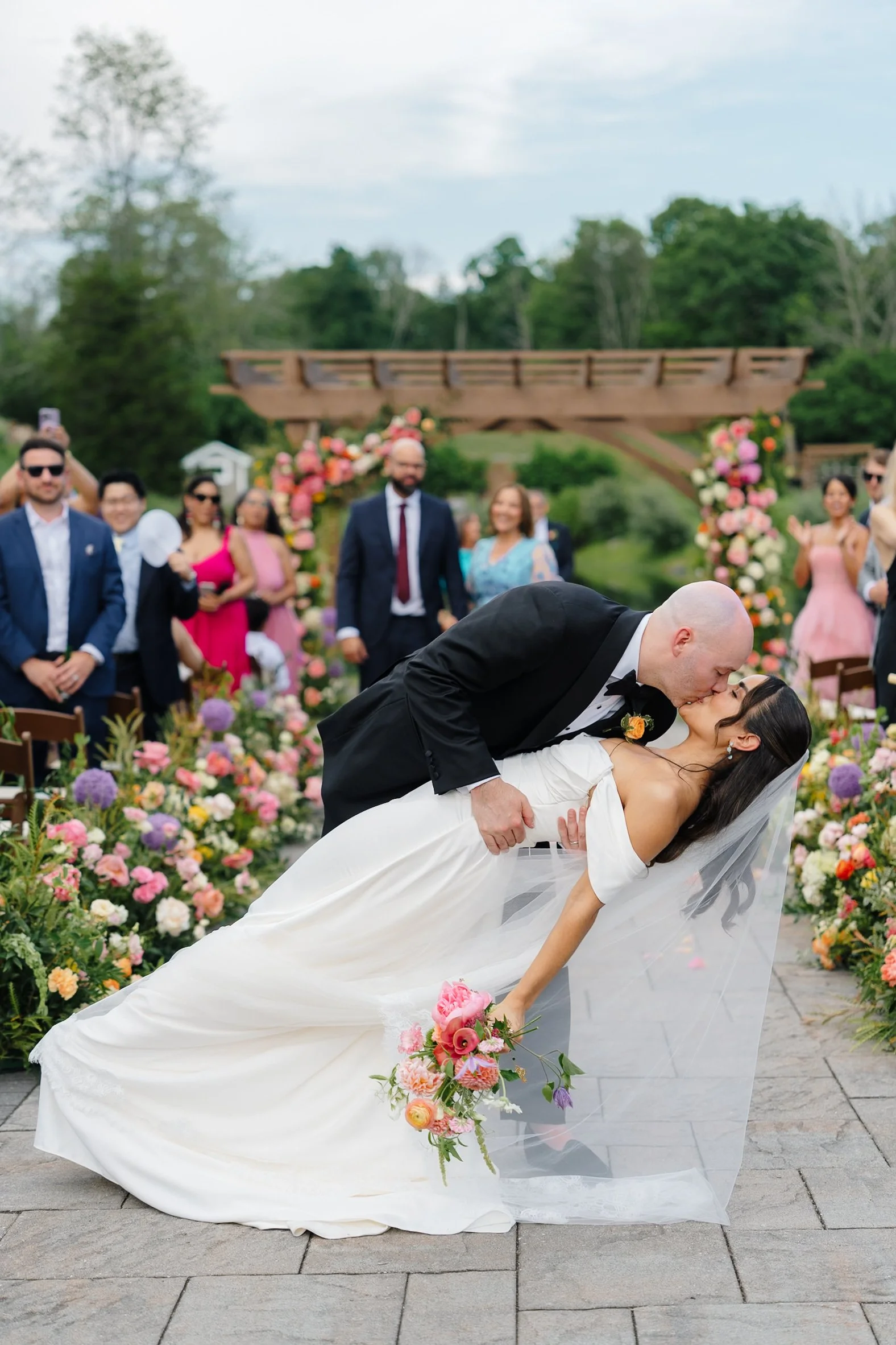 just married, kissing, dip, pond ceremony.jpg
