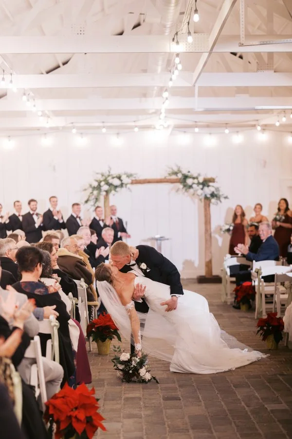 just married kissing stables winter.jpg
