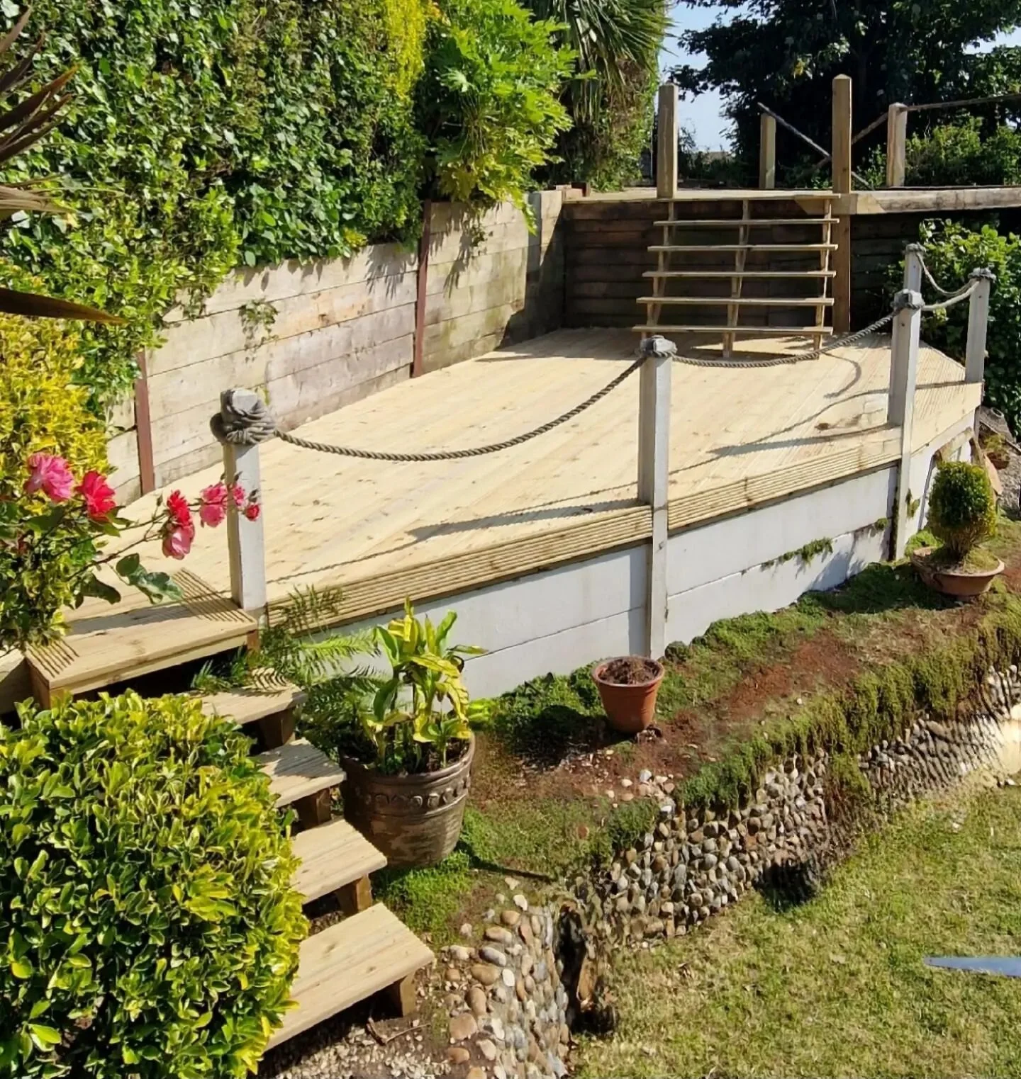 Phase 1 of our decking project in St Leonards.

The deck was rotten beyond saving so a complete rip out and new frame was installed.
Two sets of new steps, one to the lower deck and one to the deck above (phase 2)

Really happy with the outcome of th