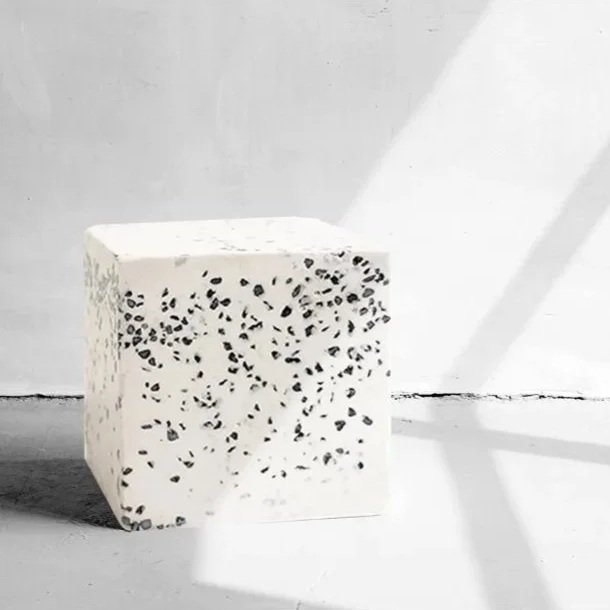 Tic Tac Toe, a material study by Kasia Moskwinski combining plaster, marble fragments, hand-formed clay, and granite to investigate tactility, contrast, form, and process.