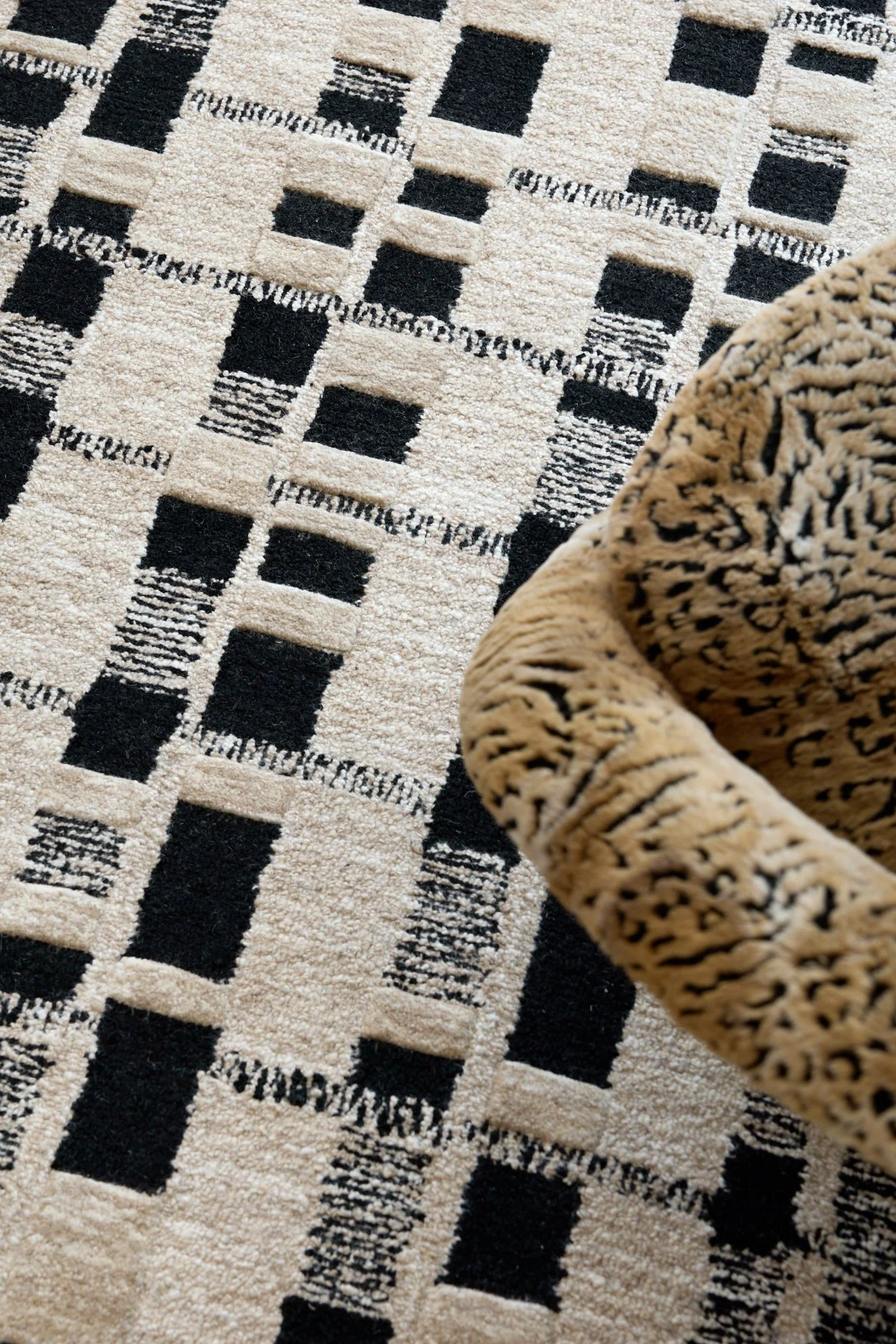 The Jinous Rug by Totzke Rugs, designed in collaboration with Nasim Köerting, design director at Merivale, part of the Azadi Collection.