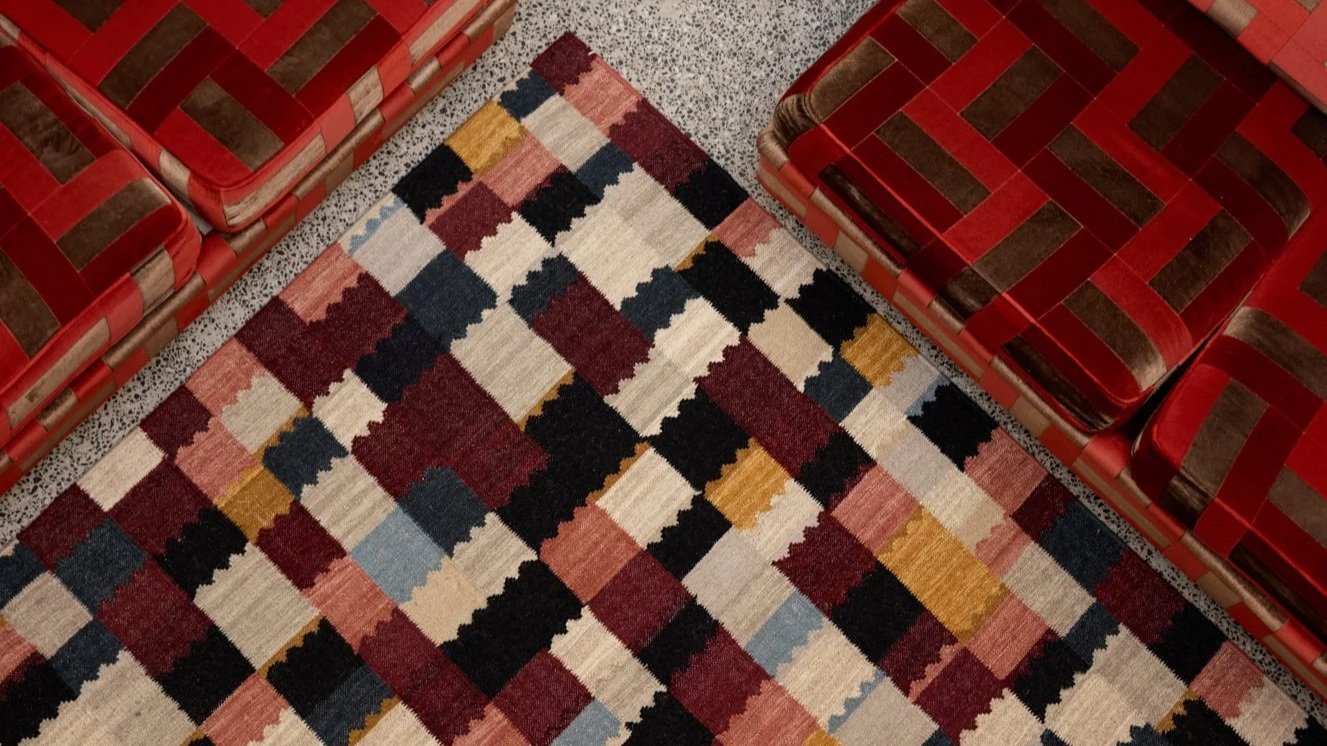 The Faroukh rug by Totzke Rugs, hand woven in wool with an added backing for commercial and hospitality specification.   Ethically handmade.