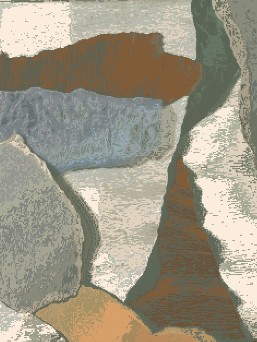 Close-up of a pile of rocks with a crushed can on top.