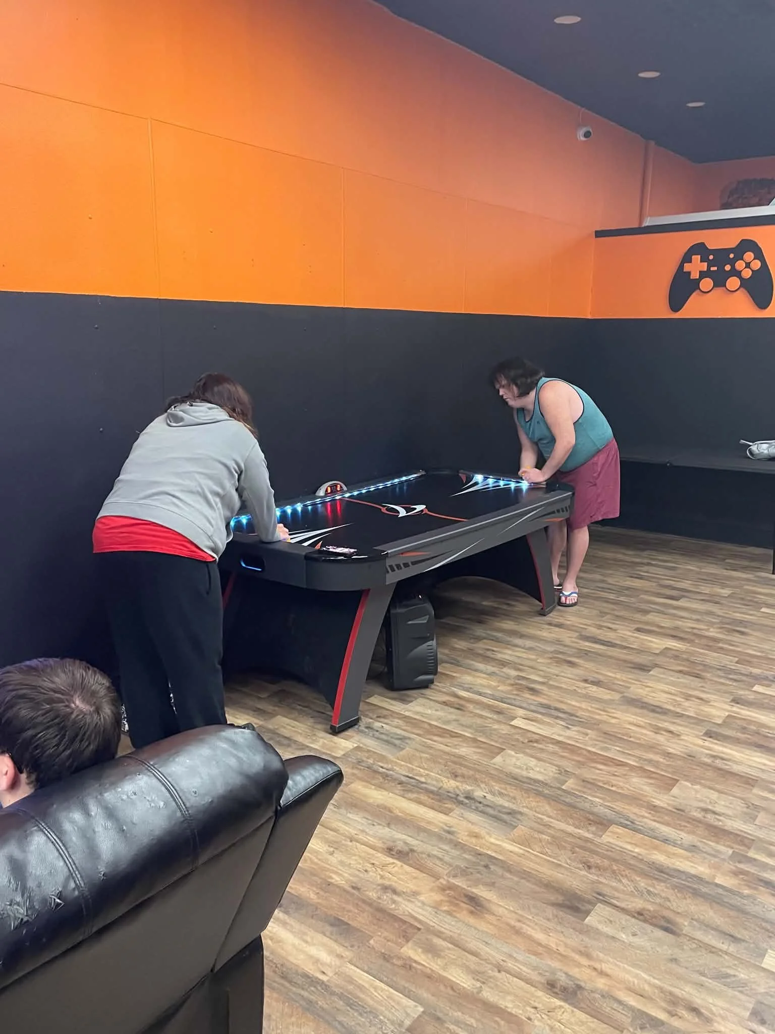 Mel and Tim airhockey.jpg