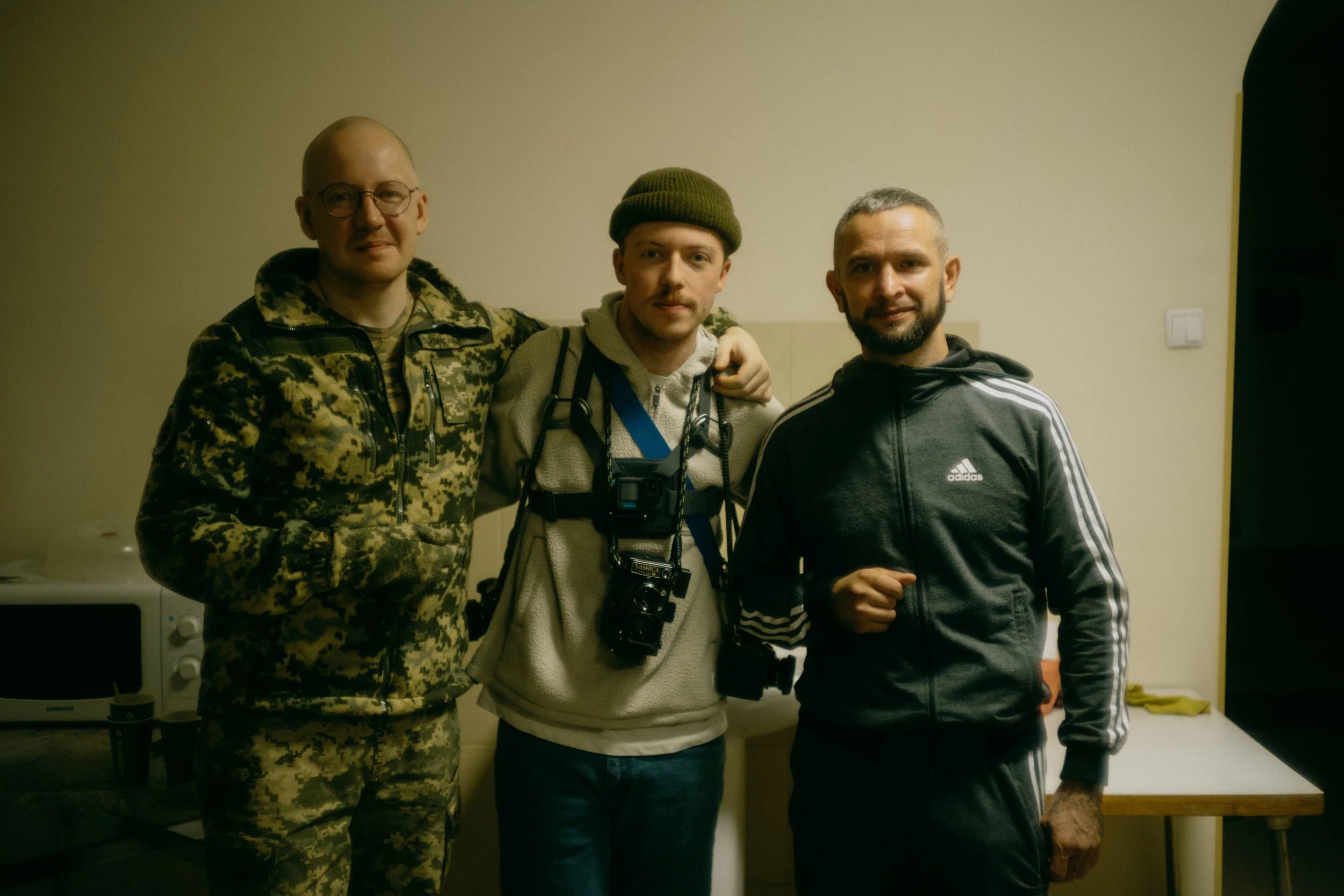 Noah Stone with injured Ukrainian soldiers, featured in 'The Grey Zone'