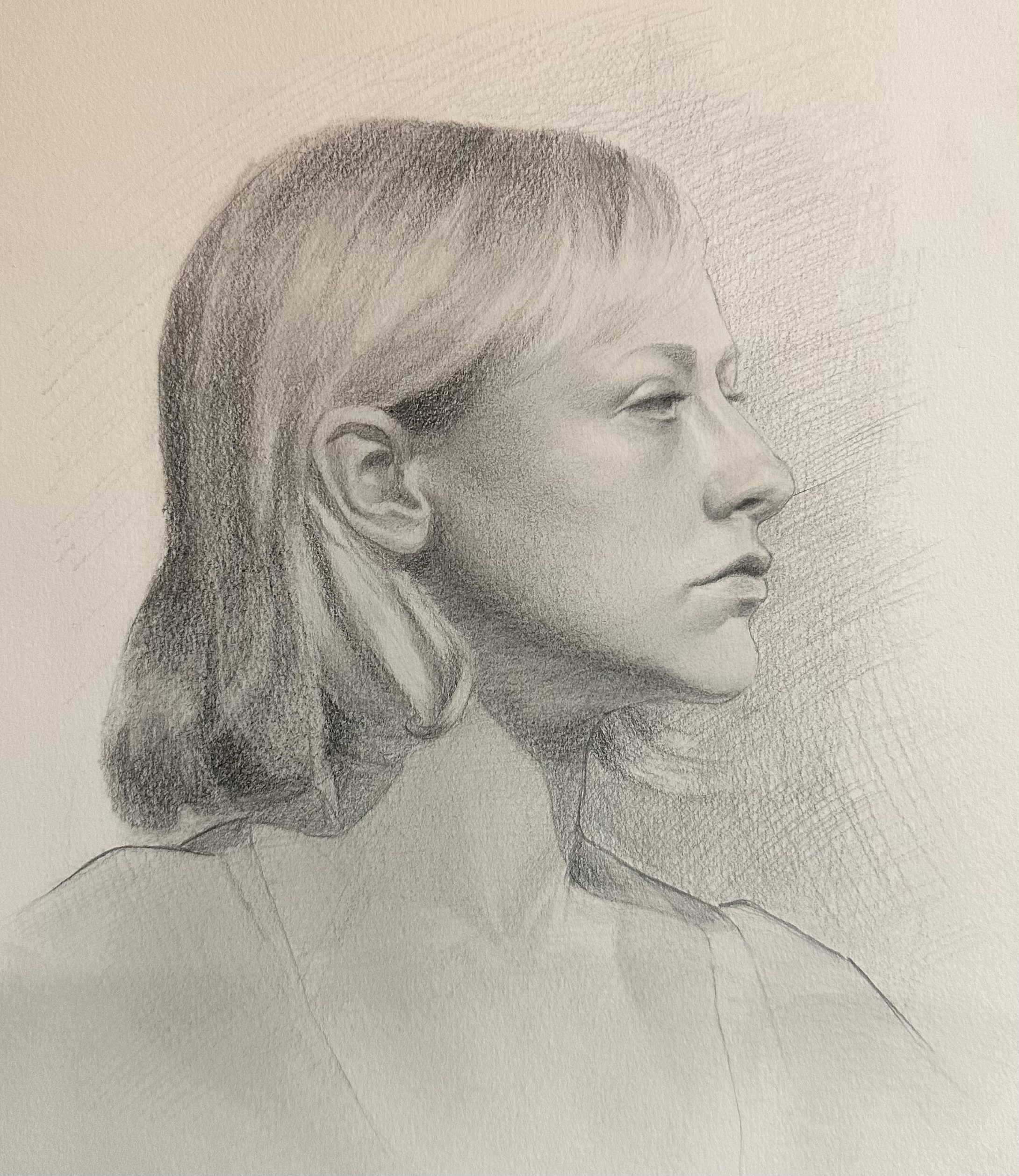 A detailed pencil sketch portrait of a woman in profile view, showcasing her facial features, hair, and neck on a textured off-white background.